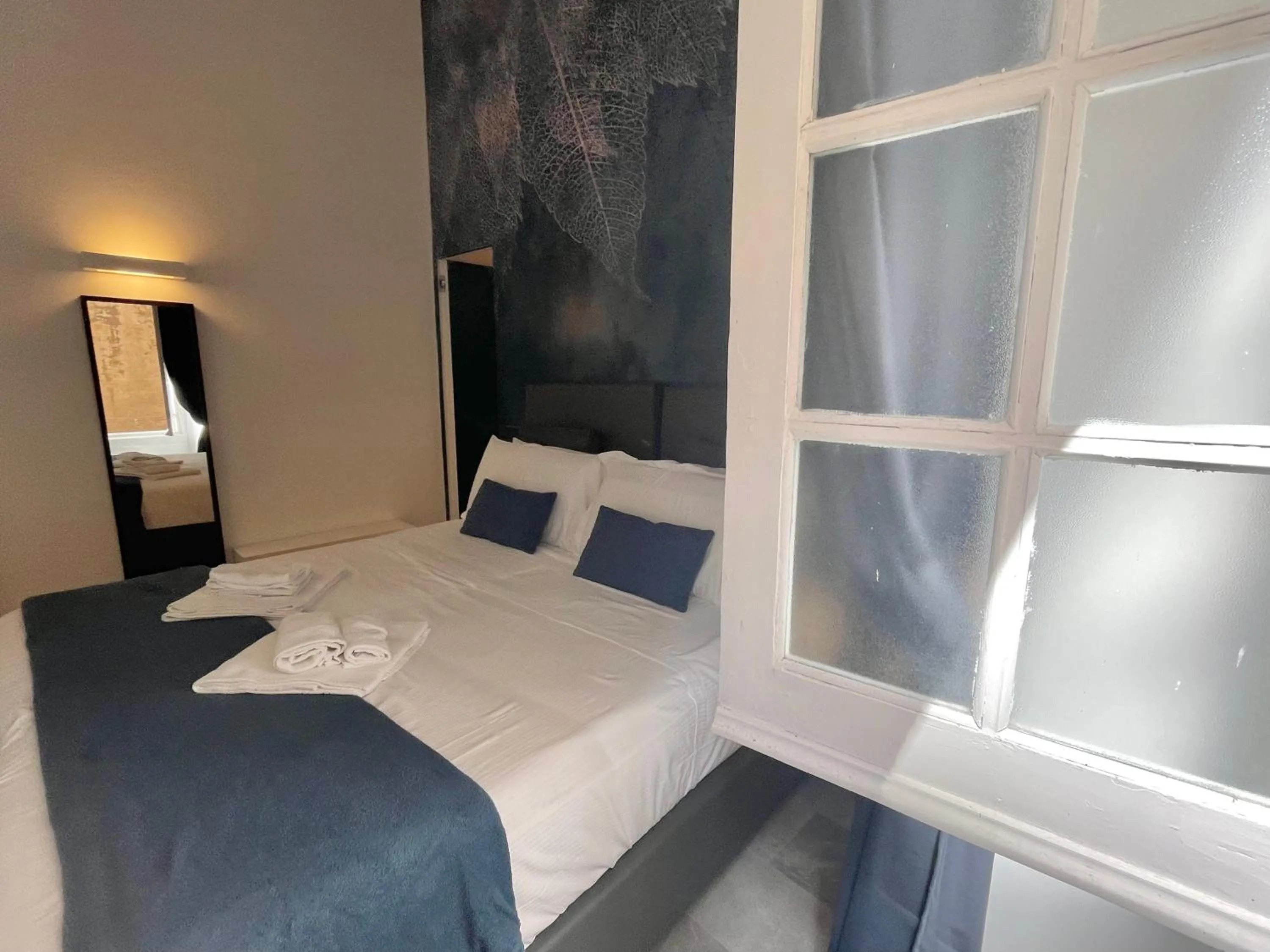 Bed in Happy Family Apartments Sauli