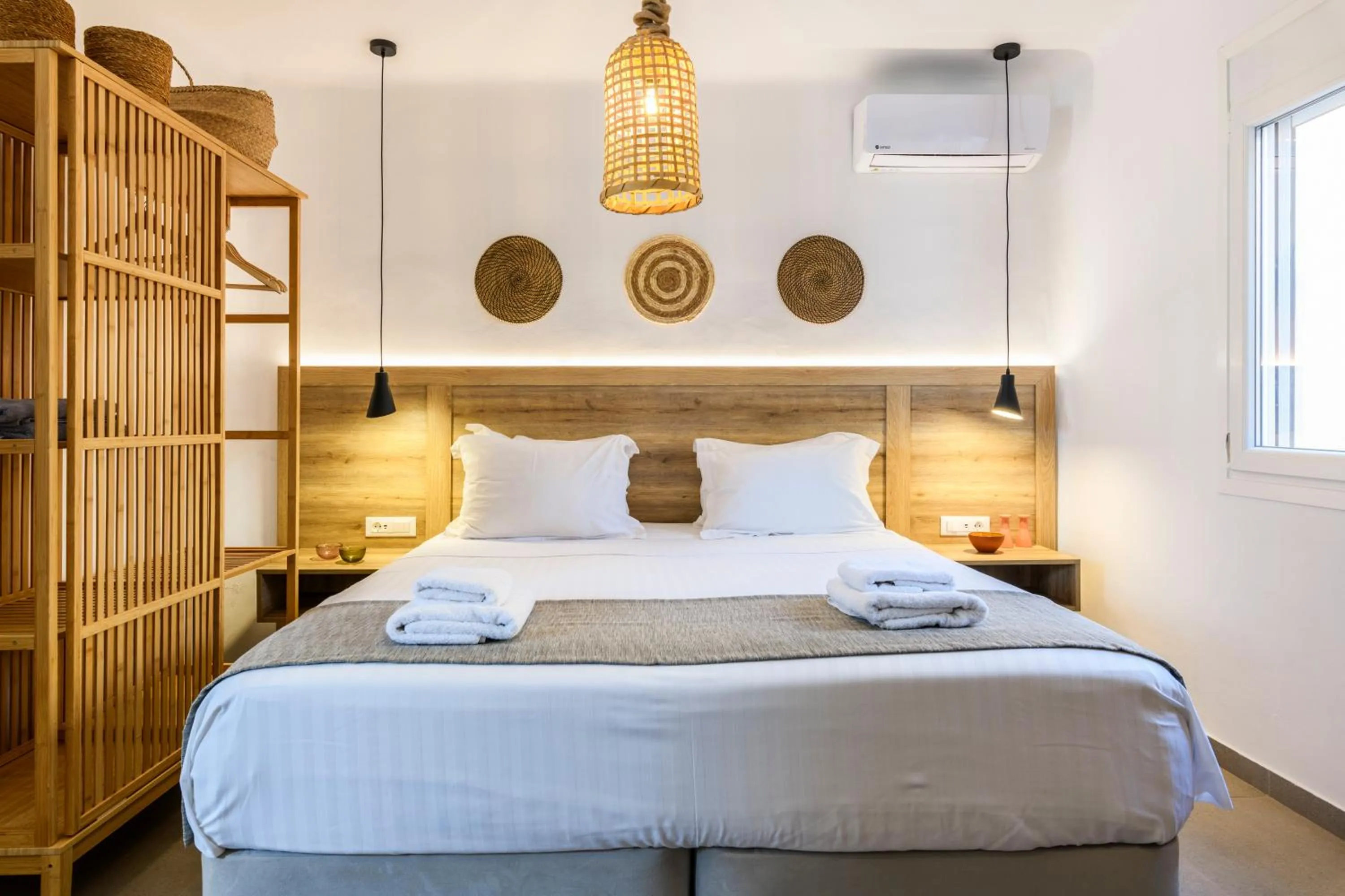 Bed in Mykonos Residence Villas & Suites Merchia beach