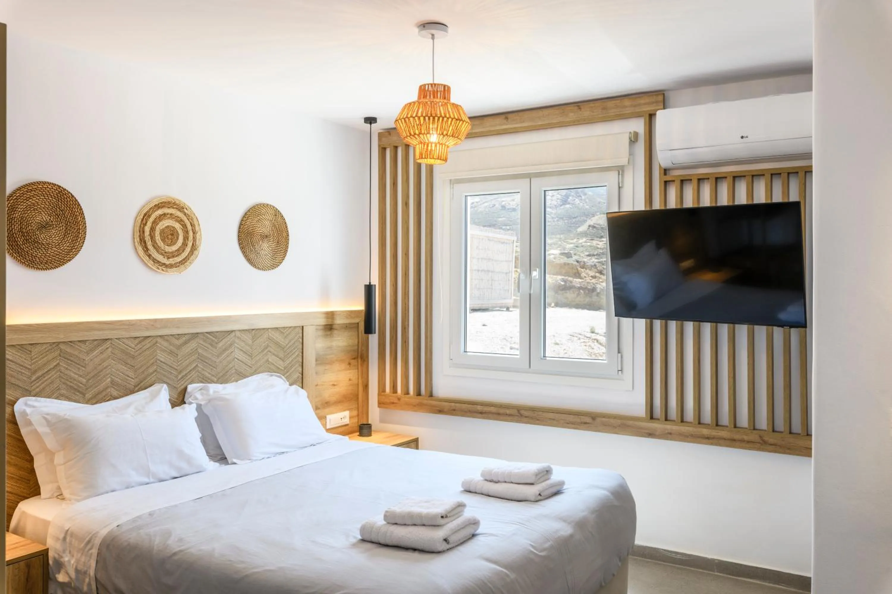 Bed in Mykonos Residence Villas & Suites Merchia beach