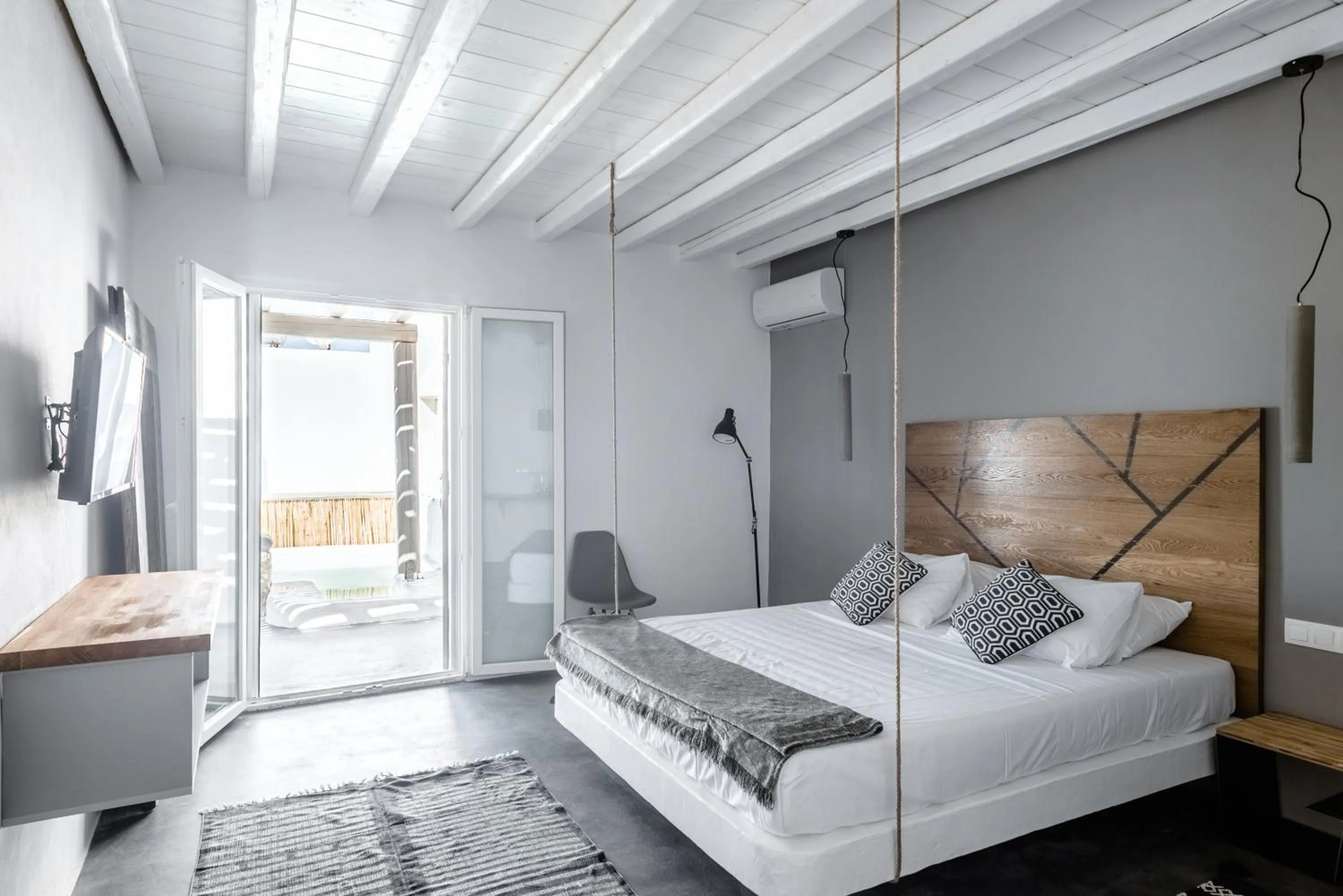 Bed in Mykonos Residence Villas & Suites Merchia beach
