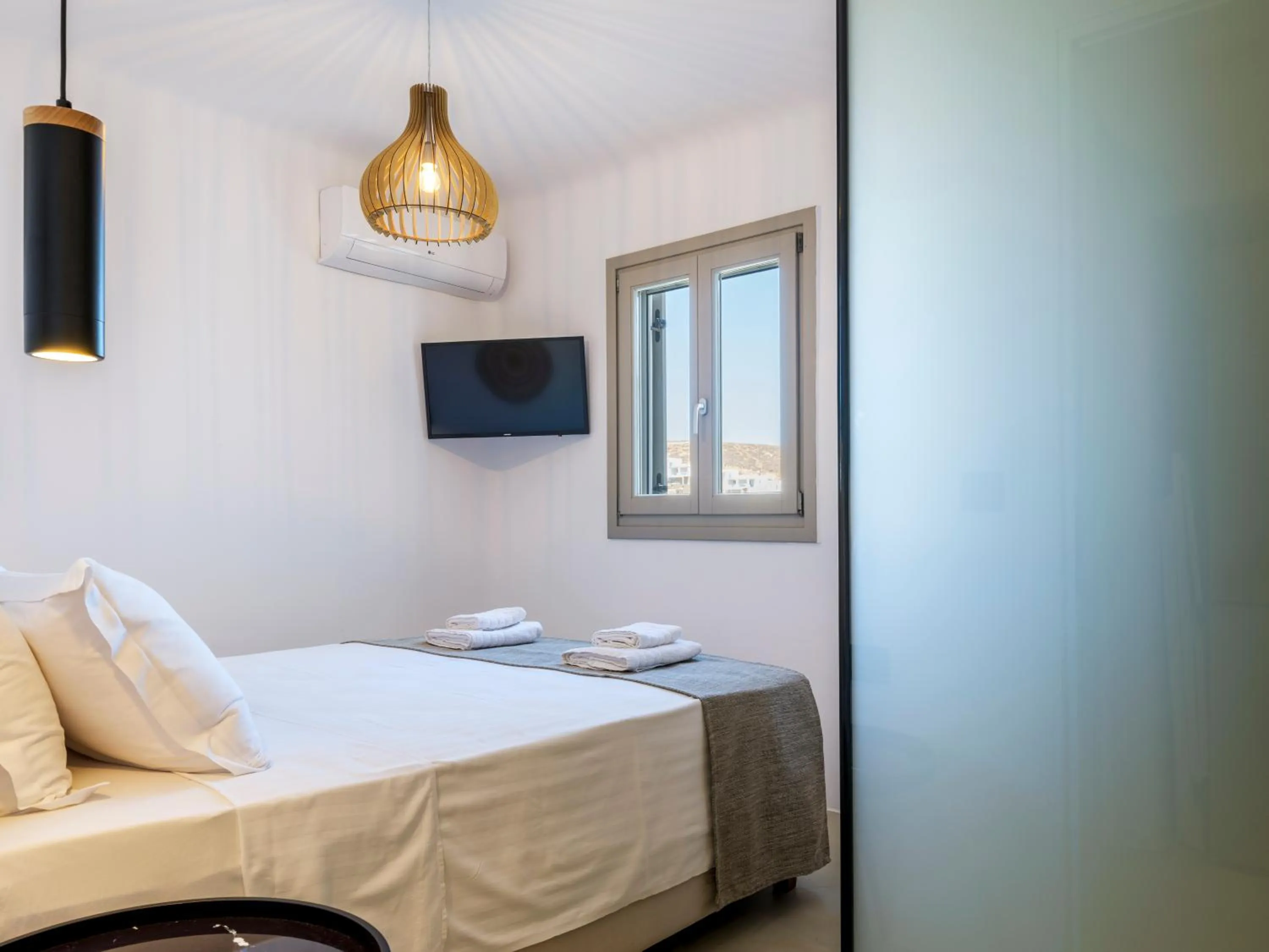 Bed in Mykonos Residence Villas & Suites Merchia beach