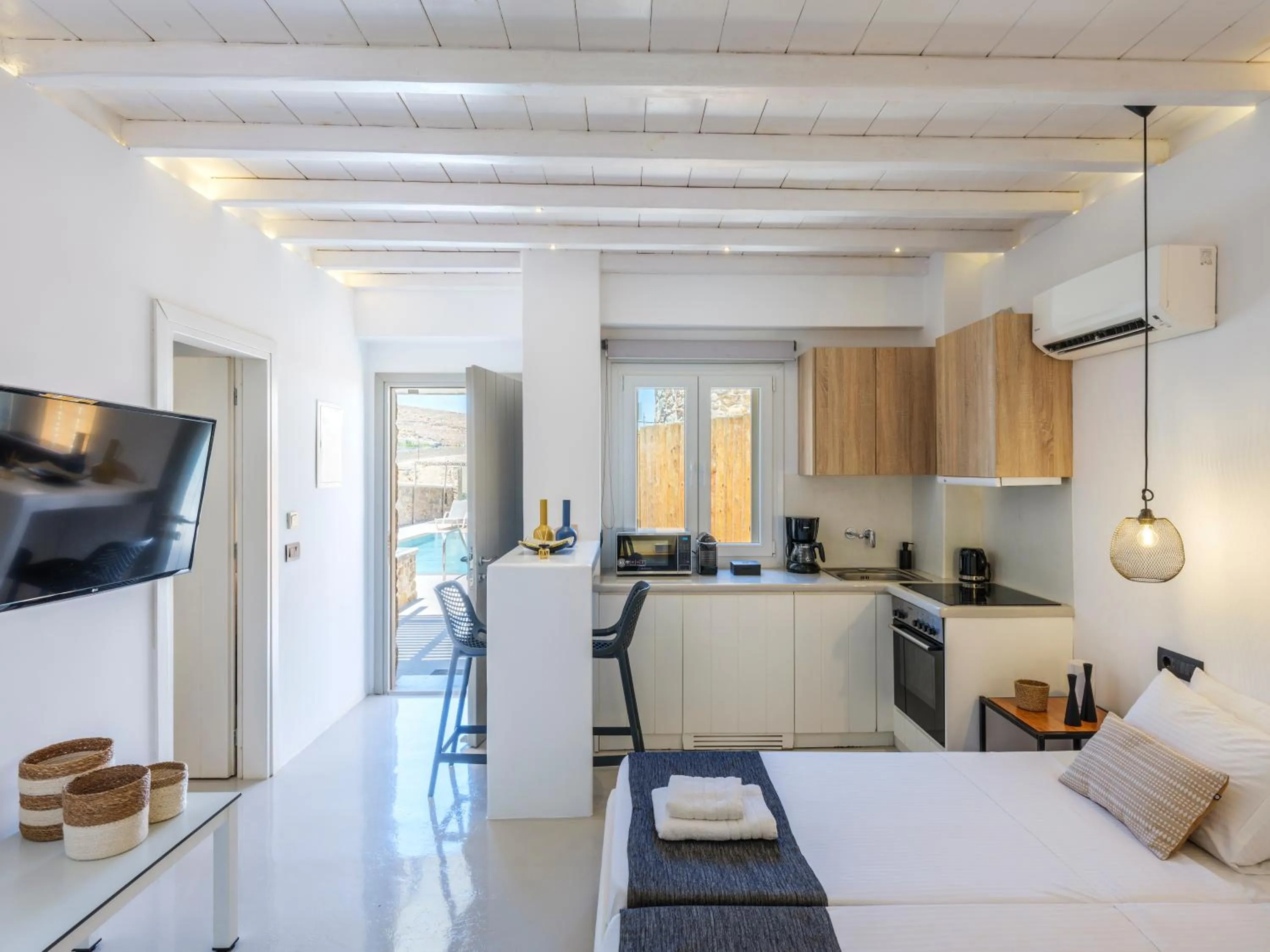 Bed in Mykonos Residence Villas & Suites Merchia beach