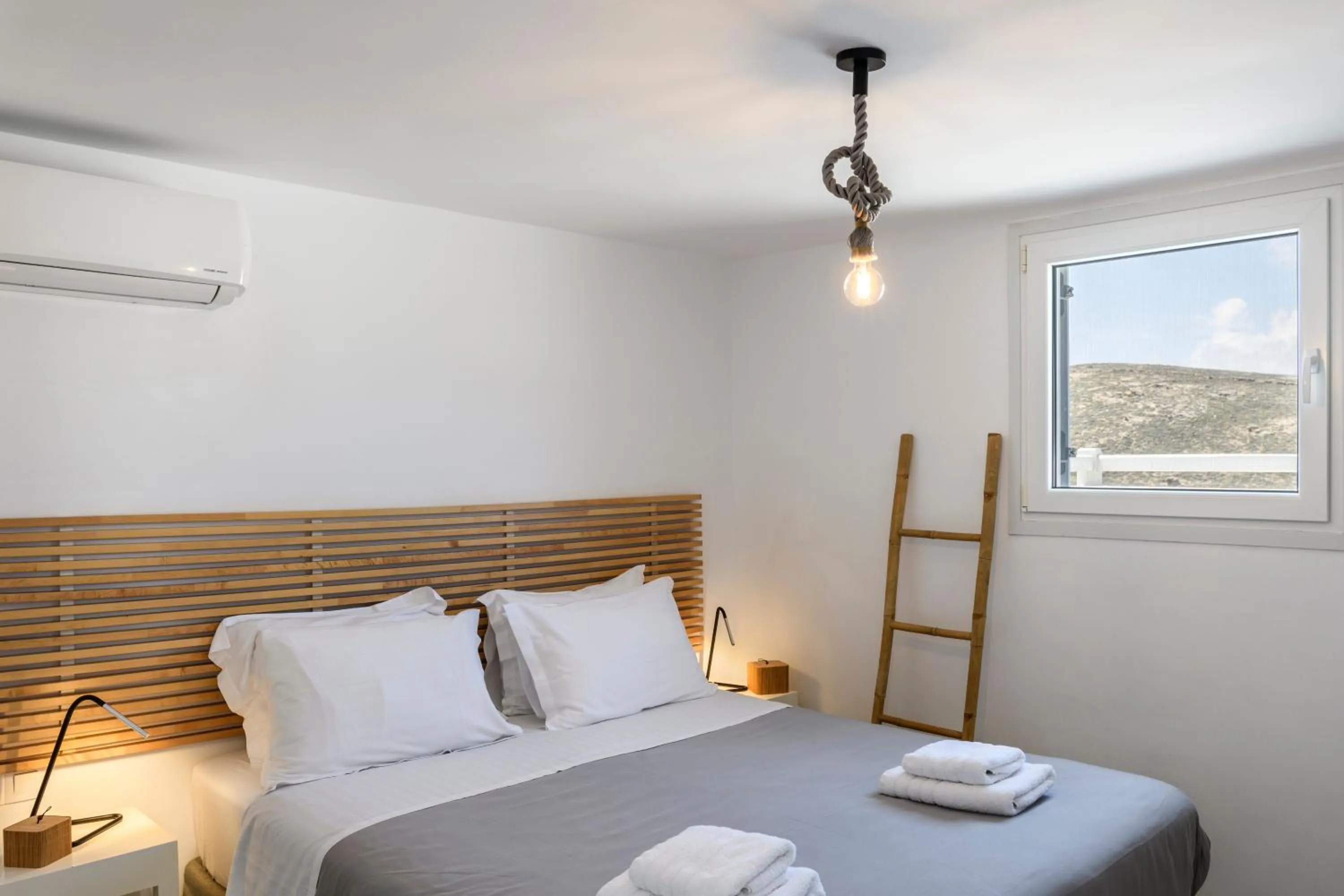 Bed in Mykonos Residence Villas & Suites Merchia beach