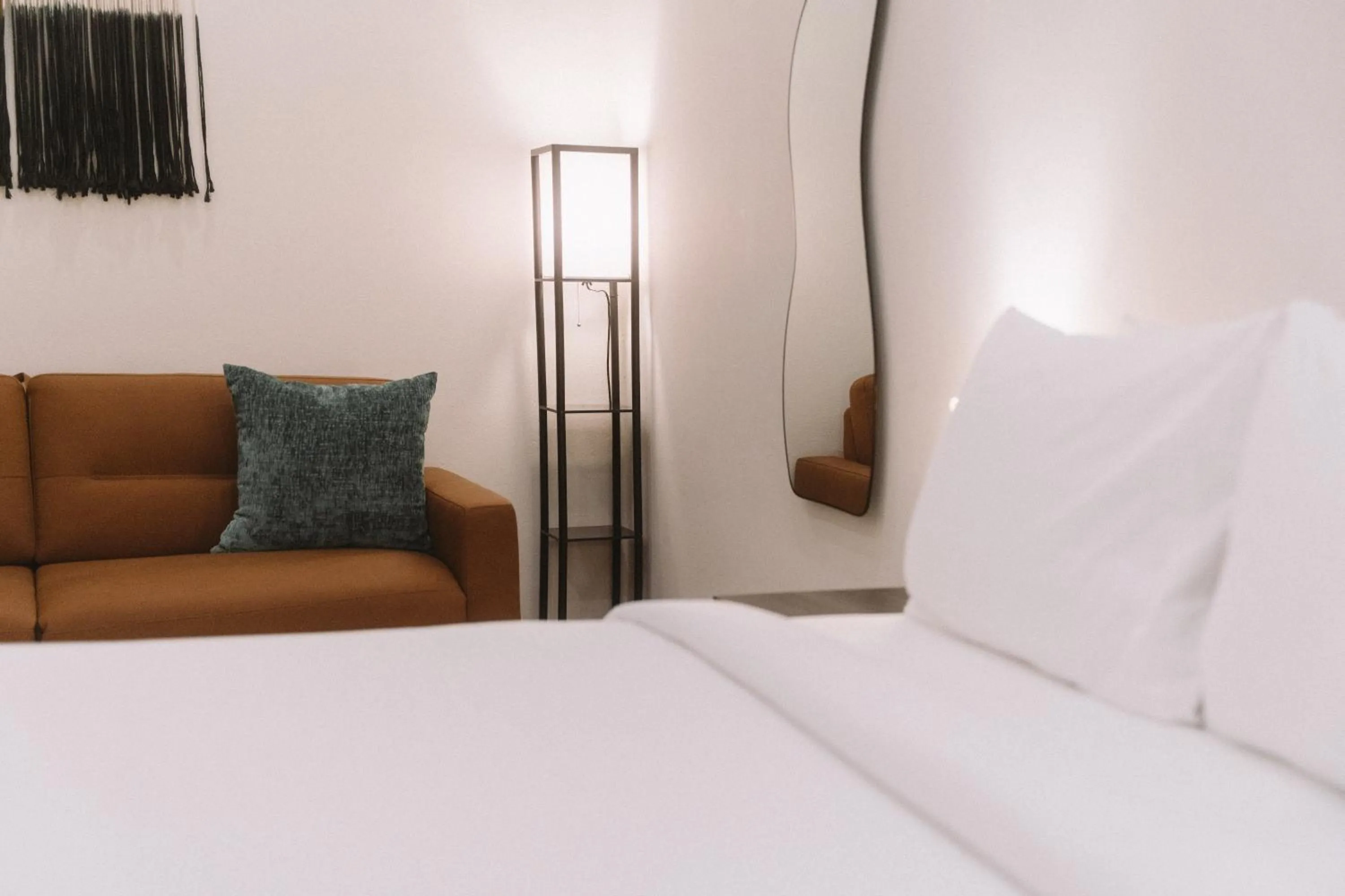 Bed in The Looking Glass Hotel