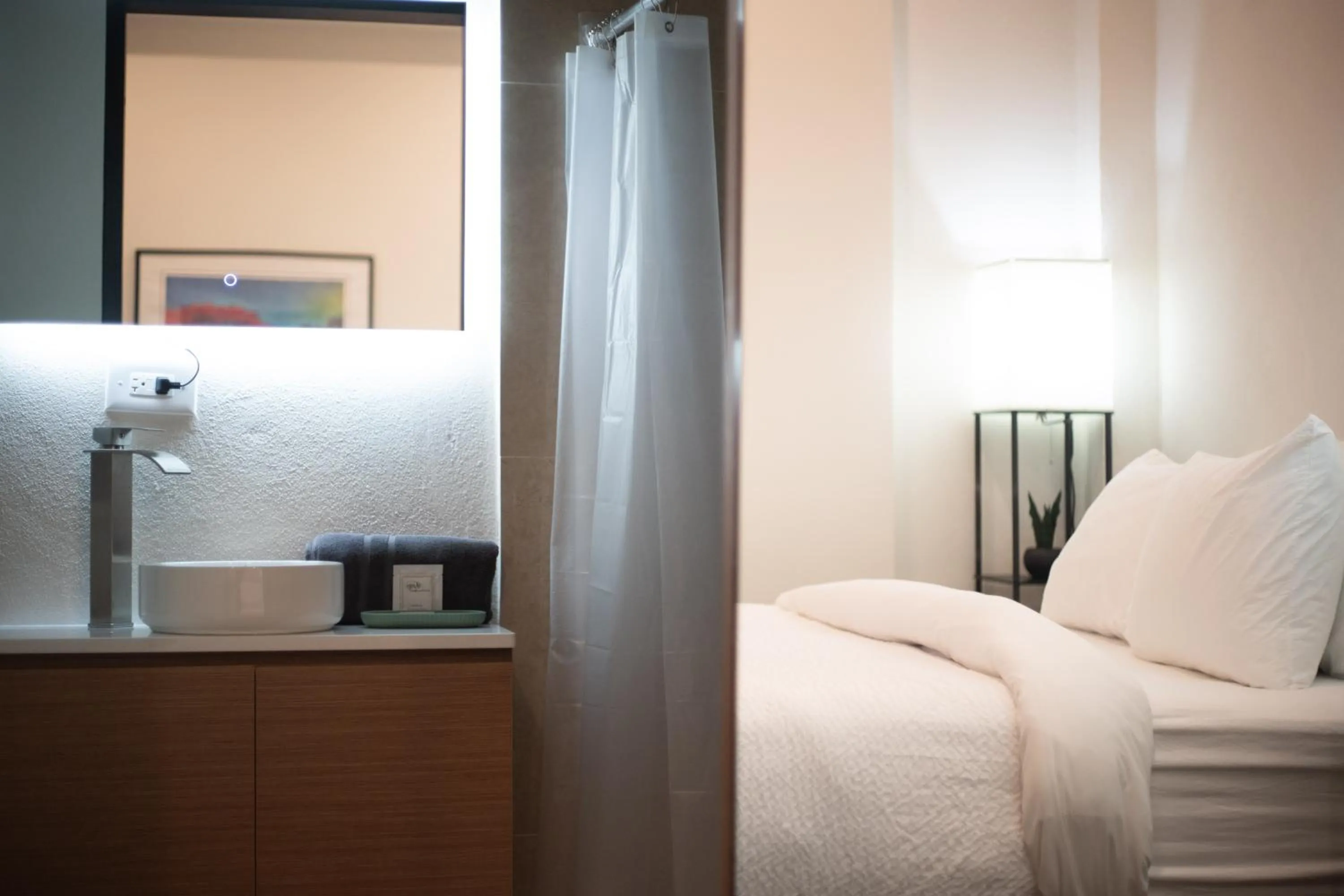 Bed in The Looking Glass Hotel