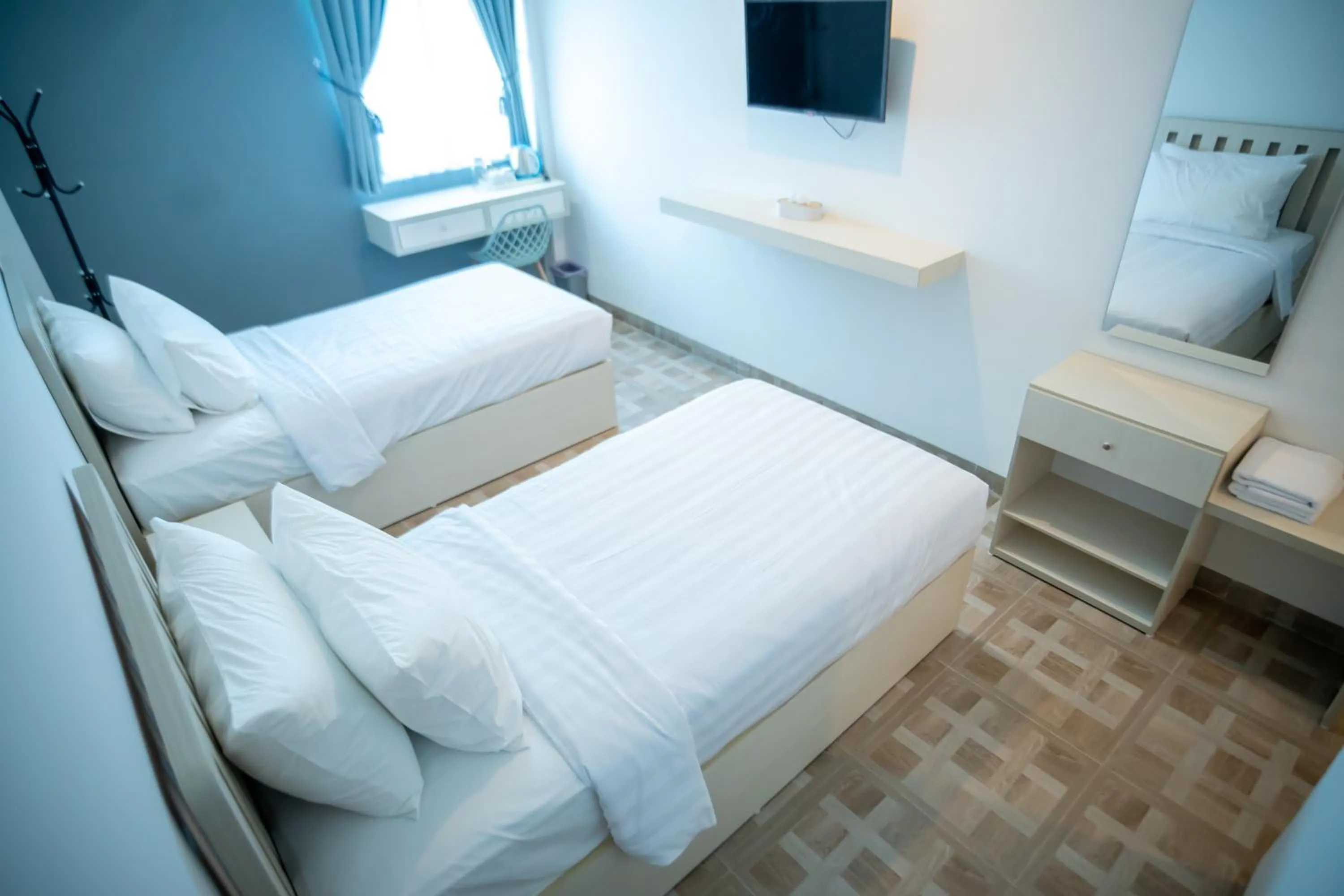 Bed in Elephant Inn and Suite by Sajiwa