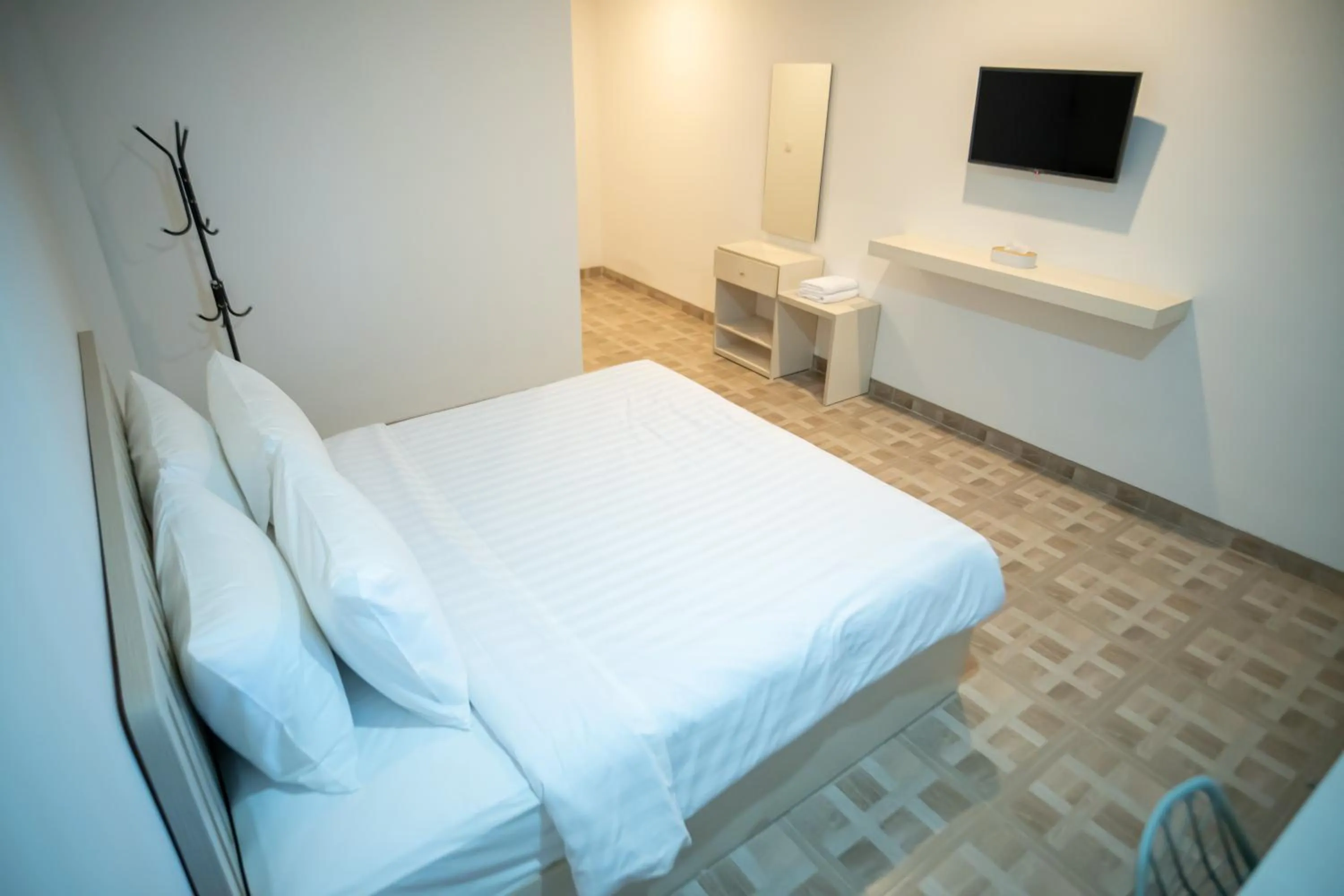 Bed in Elephant Inn and Suite by Sajiwa