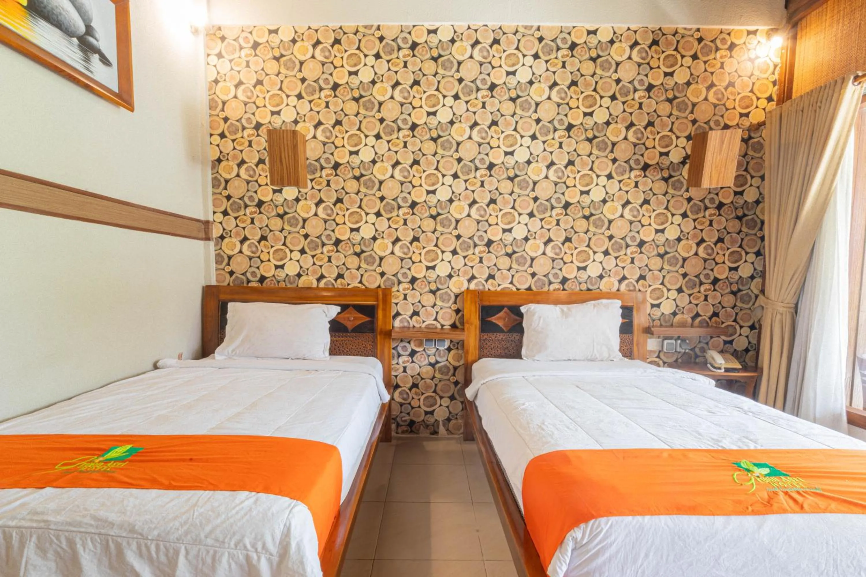 Bed in Green Asri Hotel