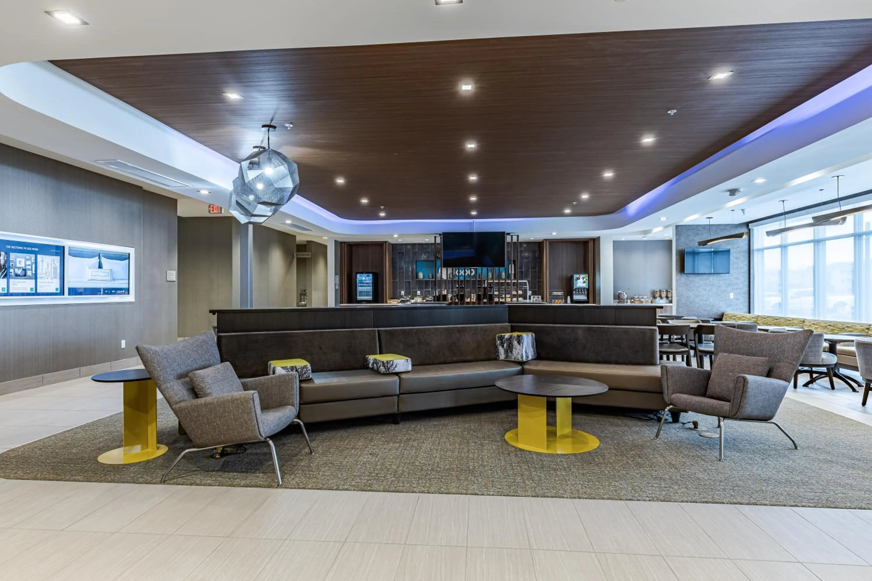 Communal lounge/ TV room in SpringHill Suites by Marriott Fort Wayne Southwest