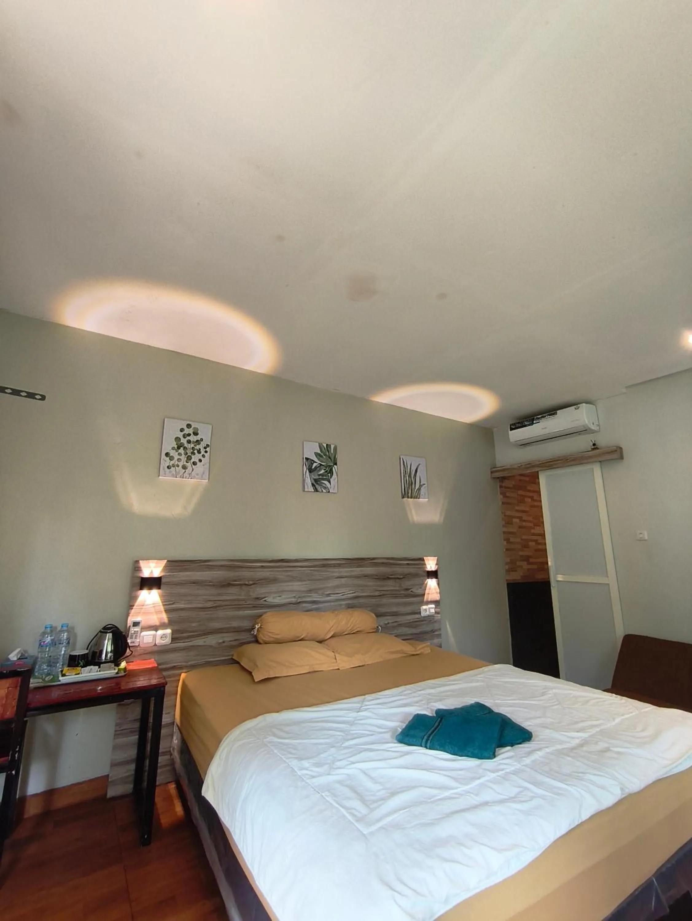 Bed in NK Villa Syariah And Cafe Prigen