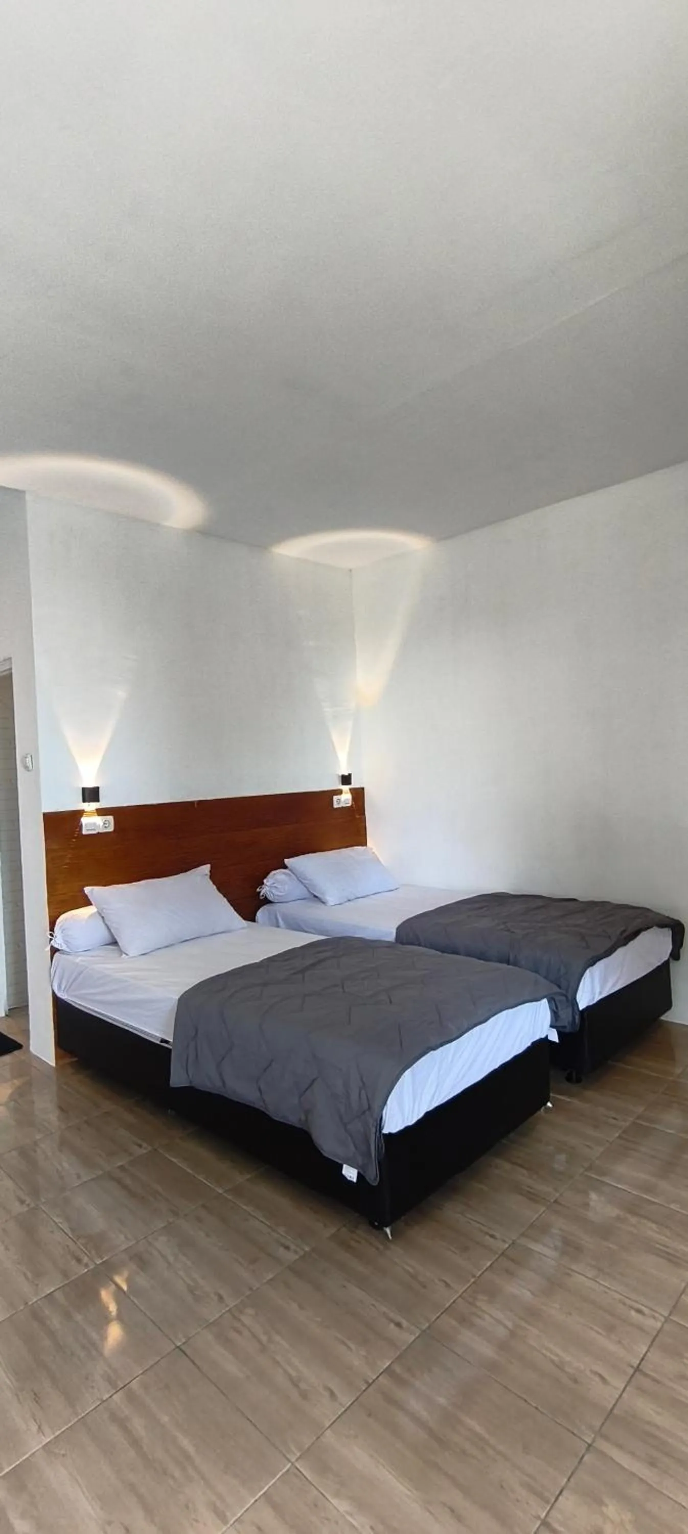 Bed in NK Villa Syariah And Cafe Prigen