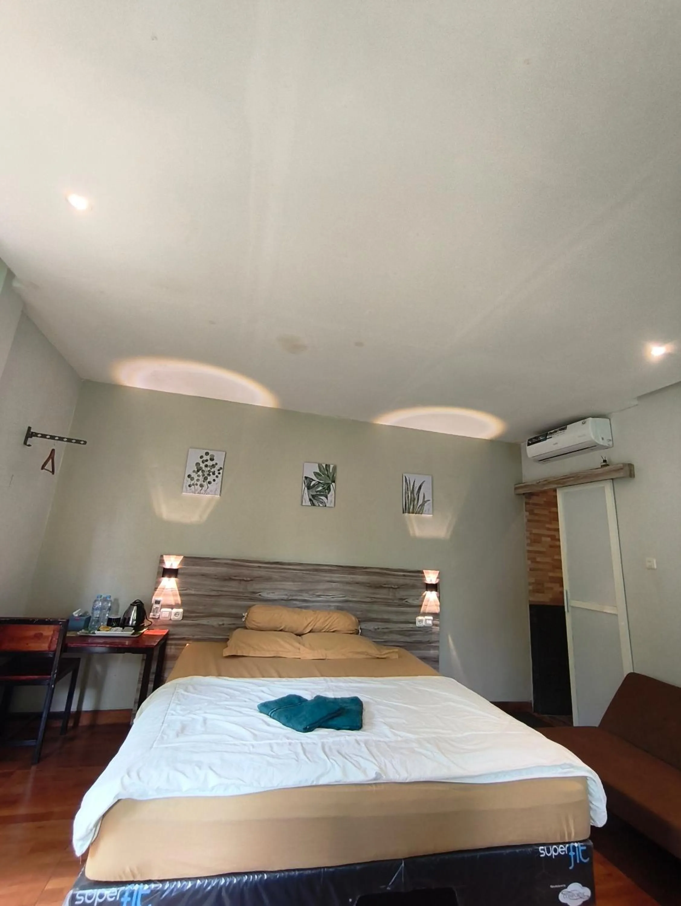 Bed in NK Villa Syariah And Cafe Prigen