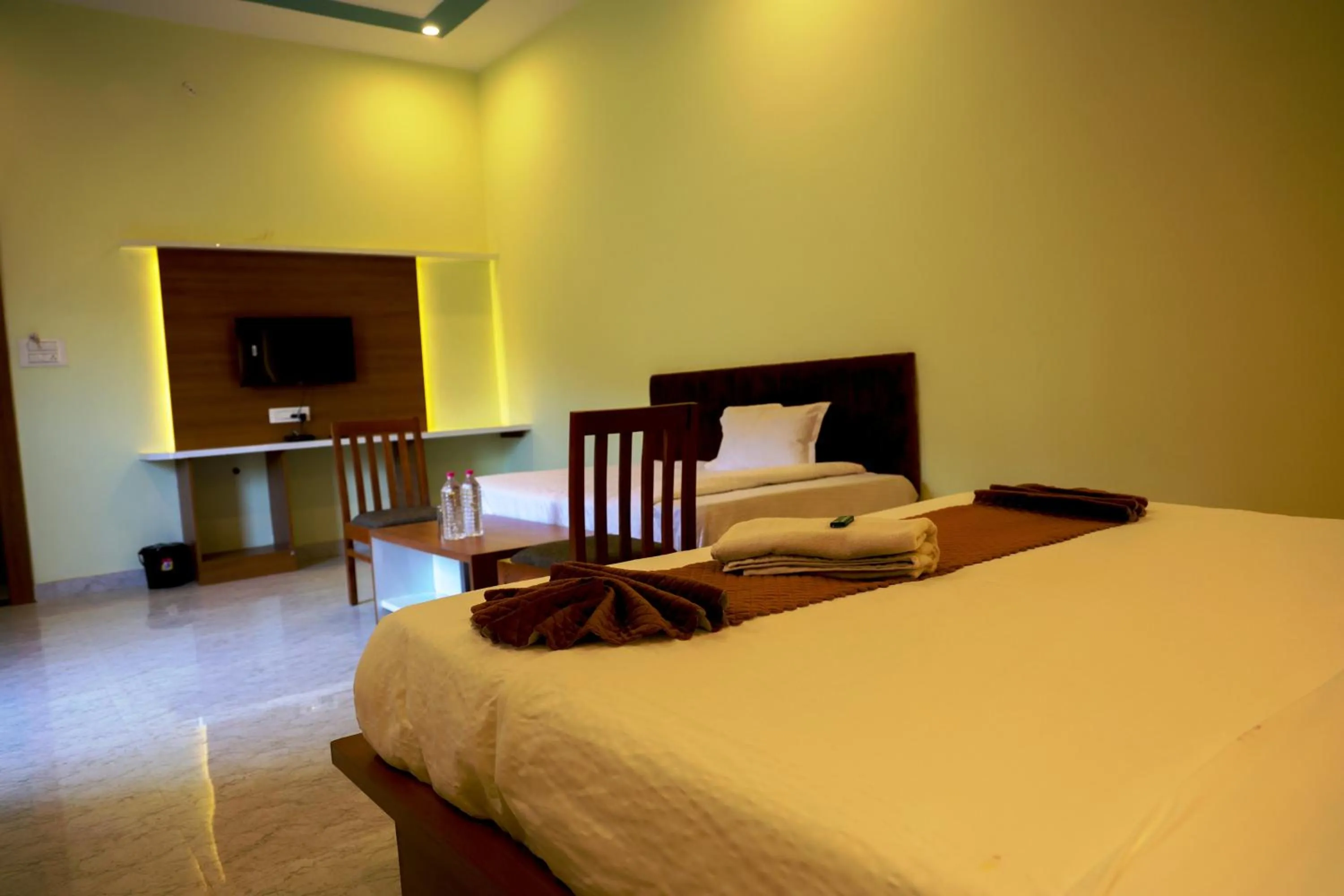 Bed in Savitri Valley Resort A Luxury Resort