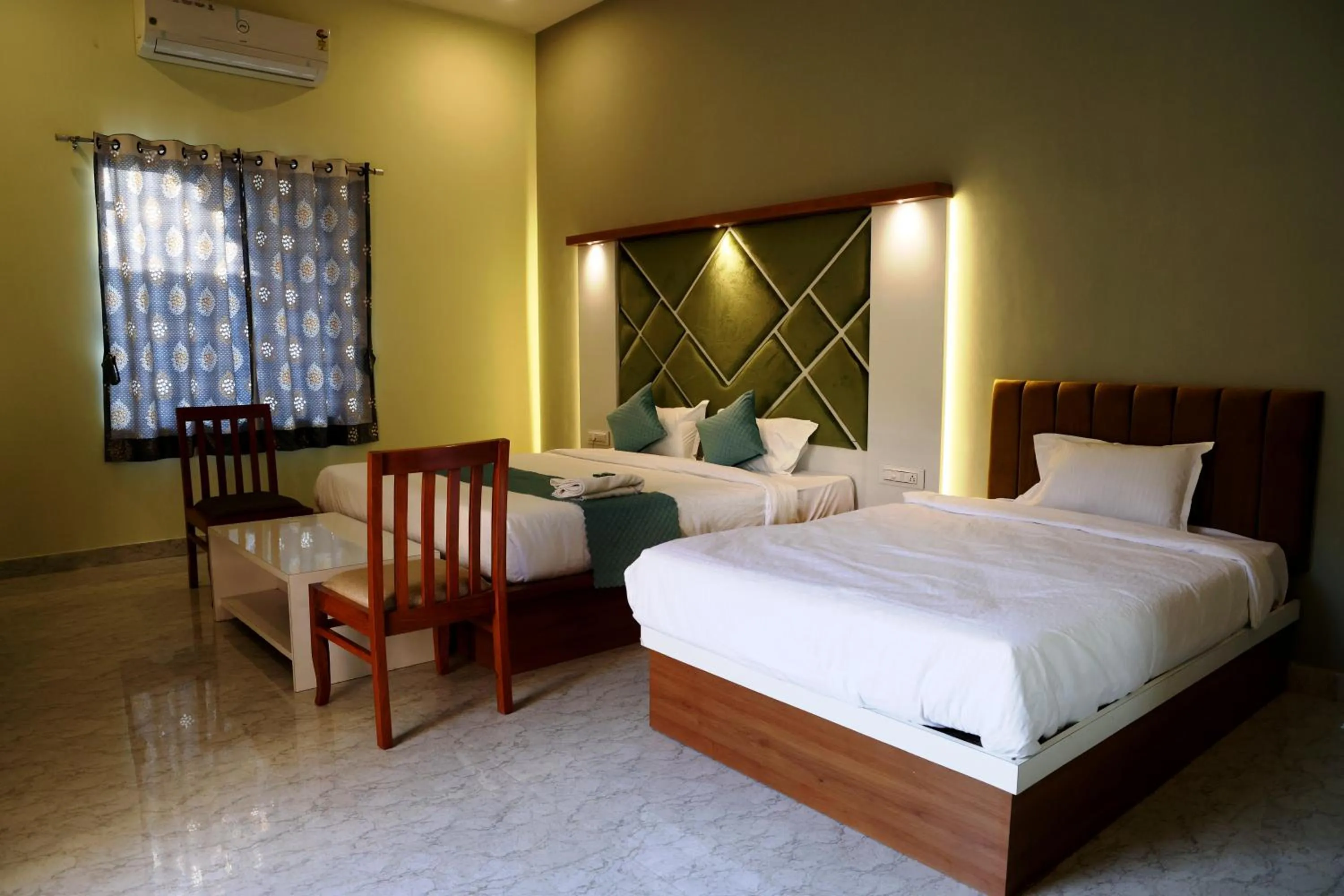 Bed in Savitri Valley Resort A Luxury Resort