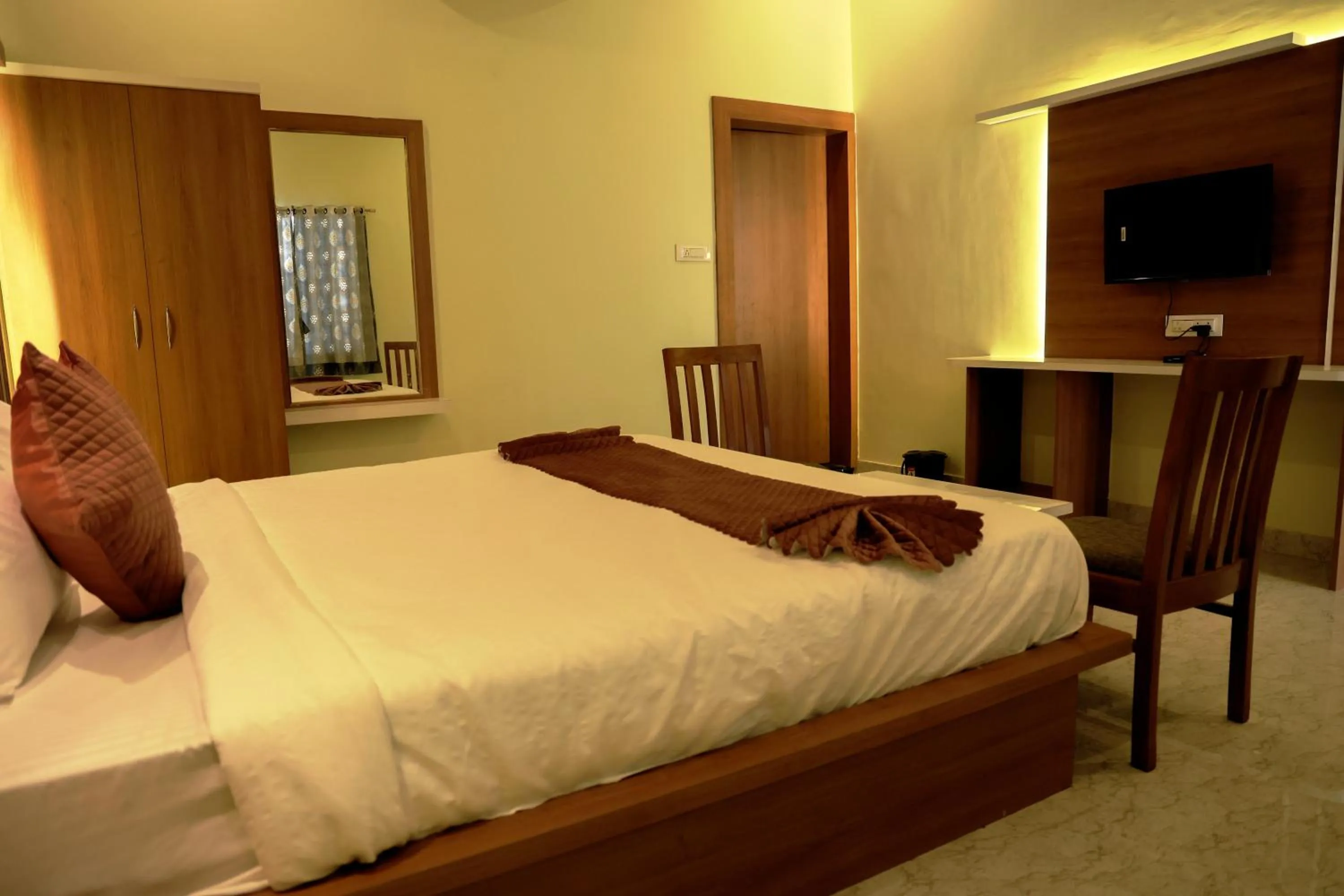 Bed in Savitri Valley Resort A Luxury Resort