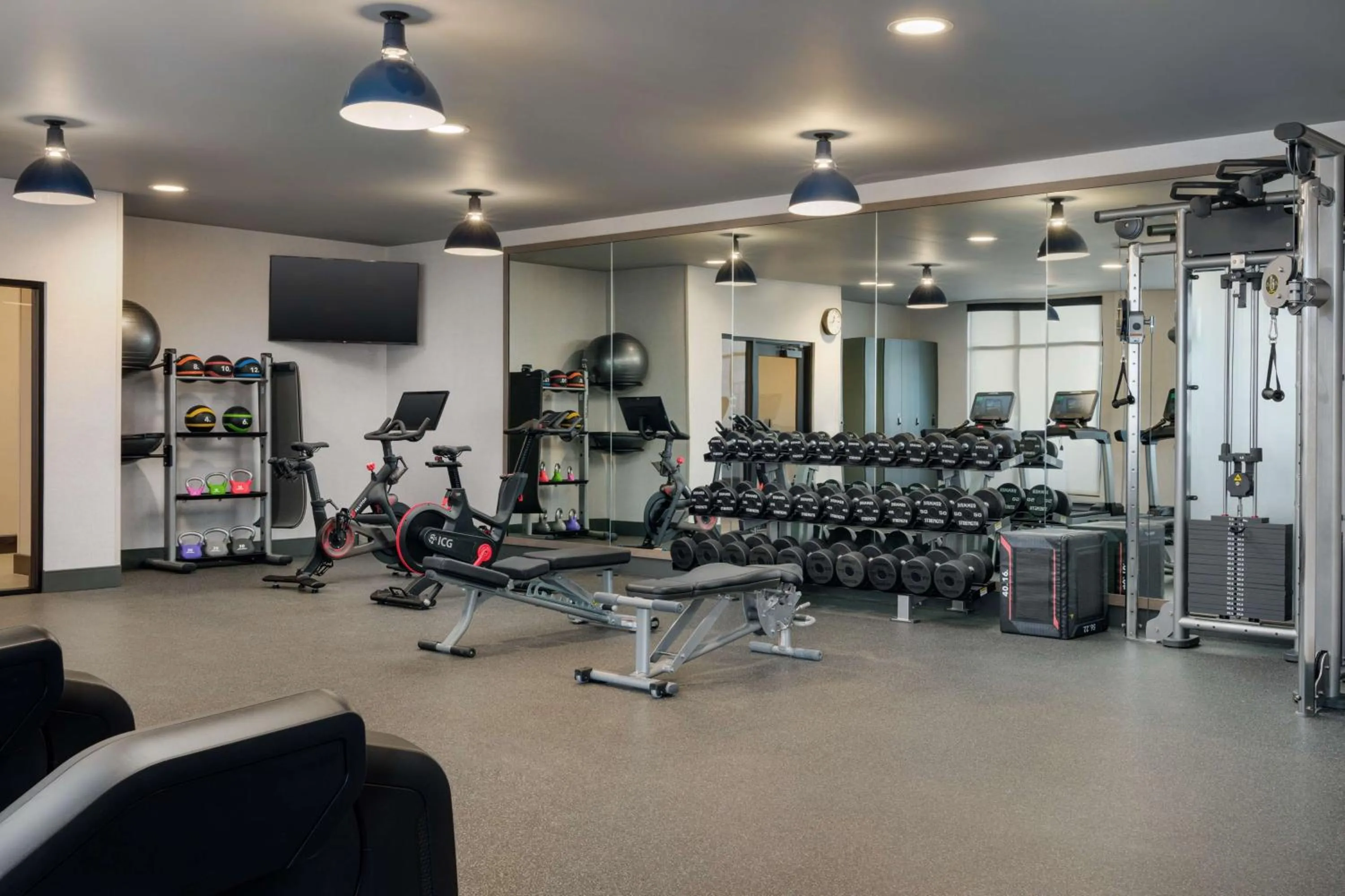 Fitness centre/facilities in The Hoffmann Hotel Basalt Aspen Tapestry Collection Hilton