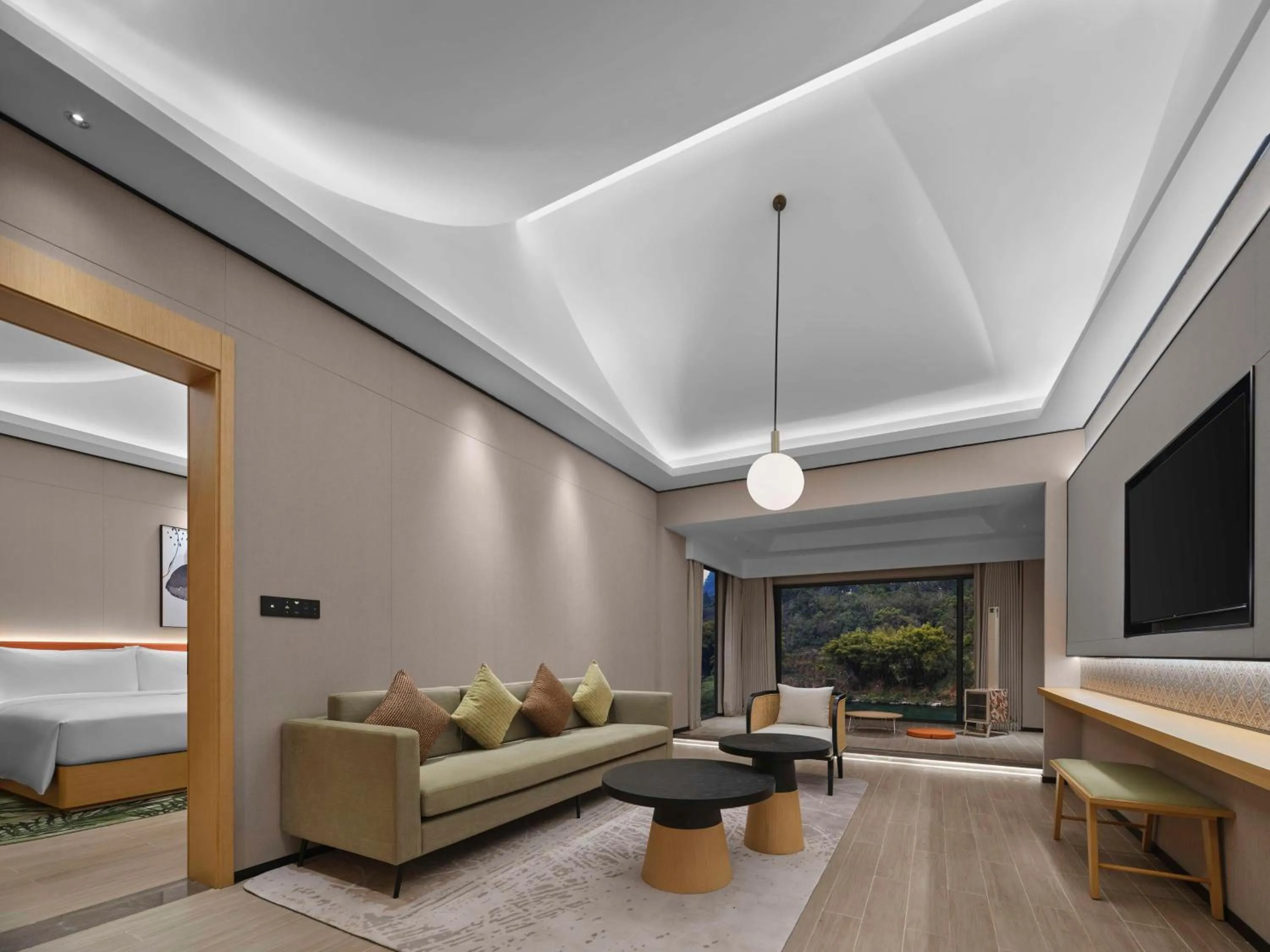 Living room, Bed in Hilton Garden Inn Guilin Yangshuo