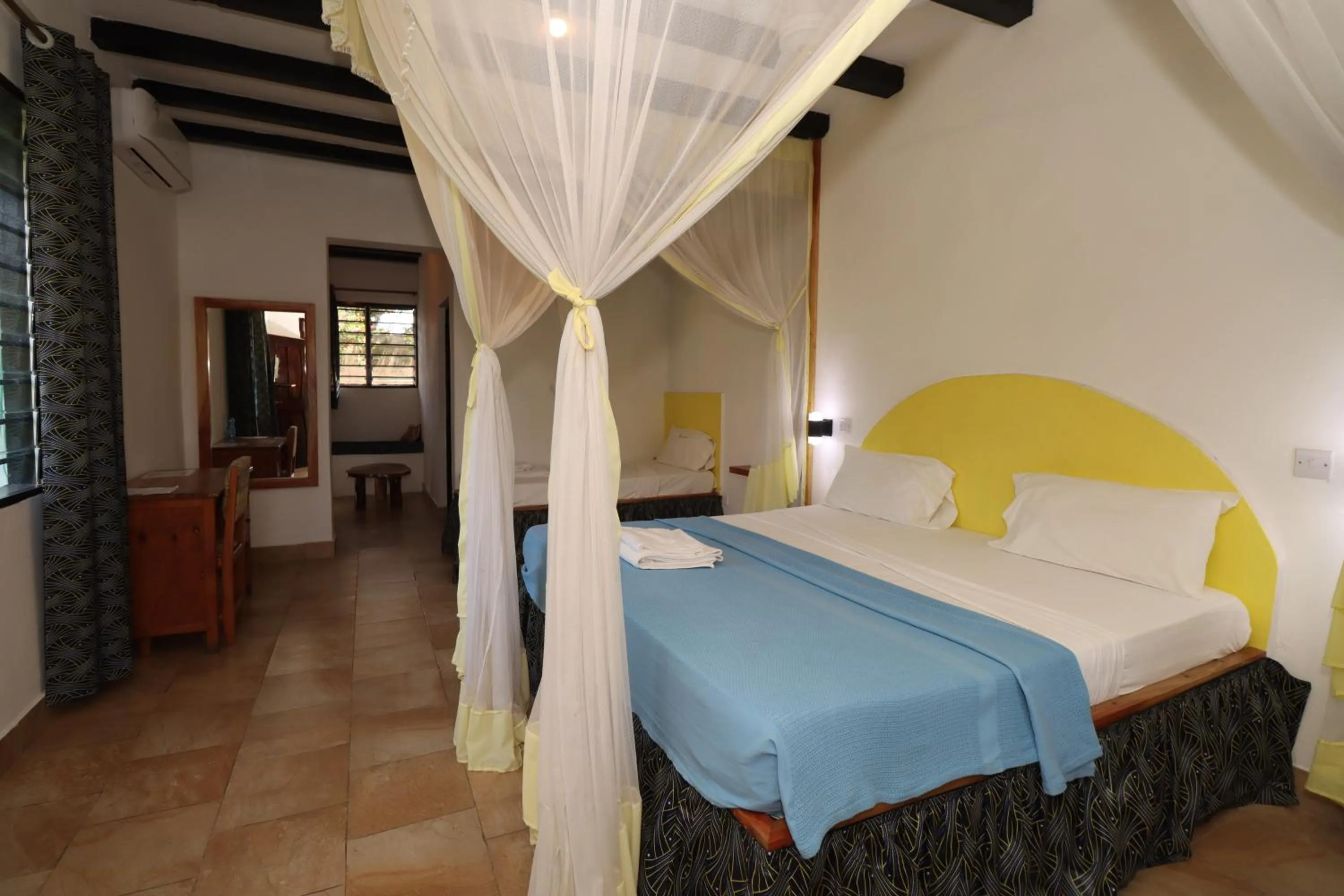 Bed in Makuti Villas Resort