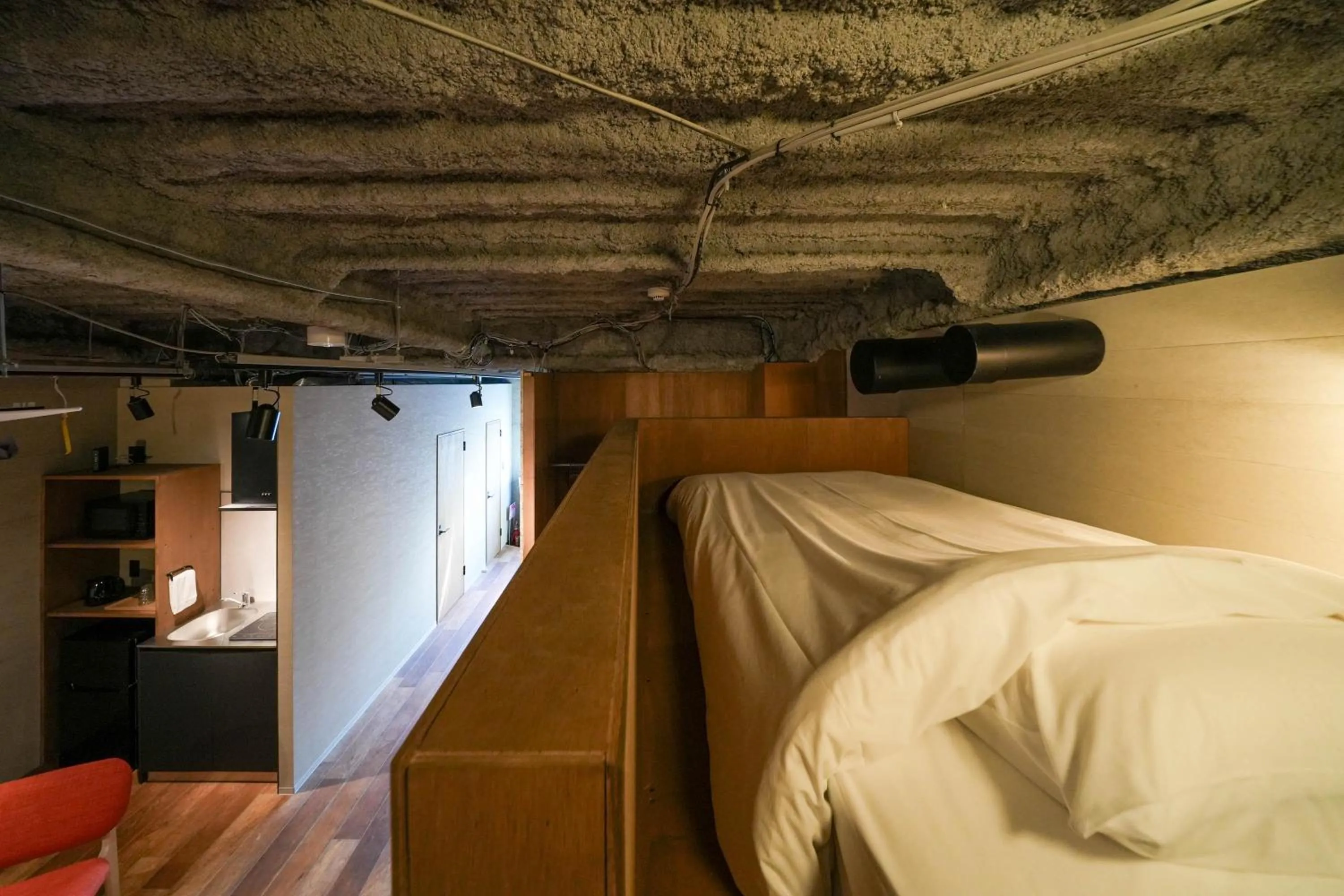 Bed in Green Room Hotel