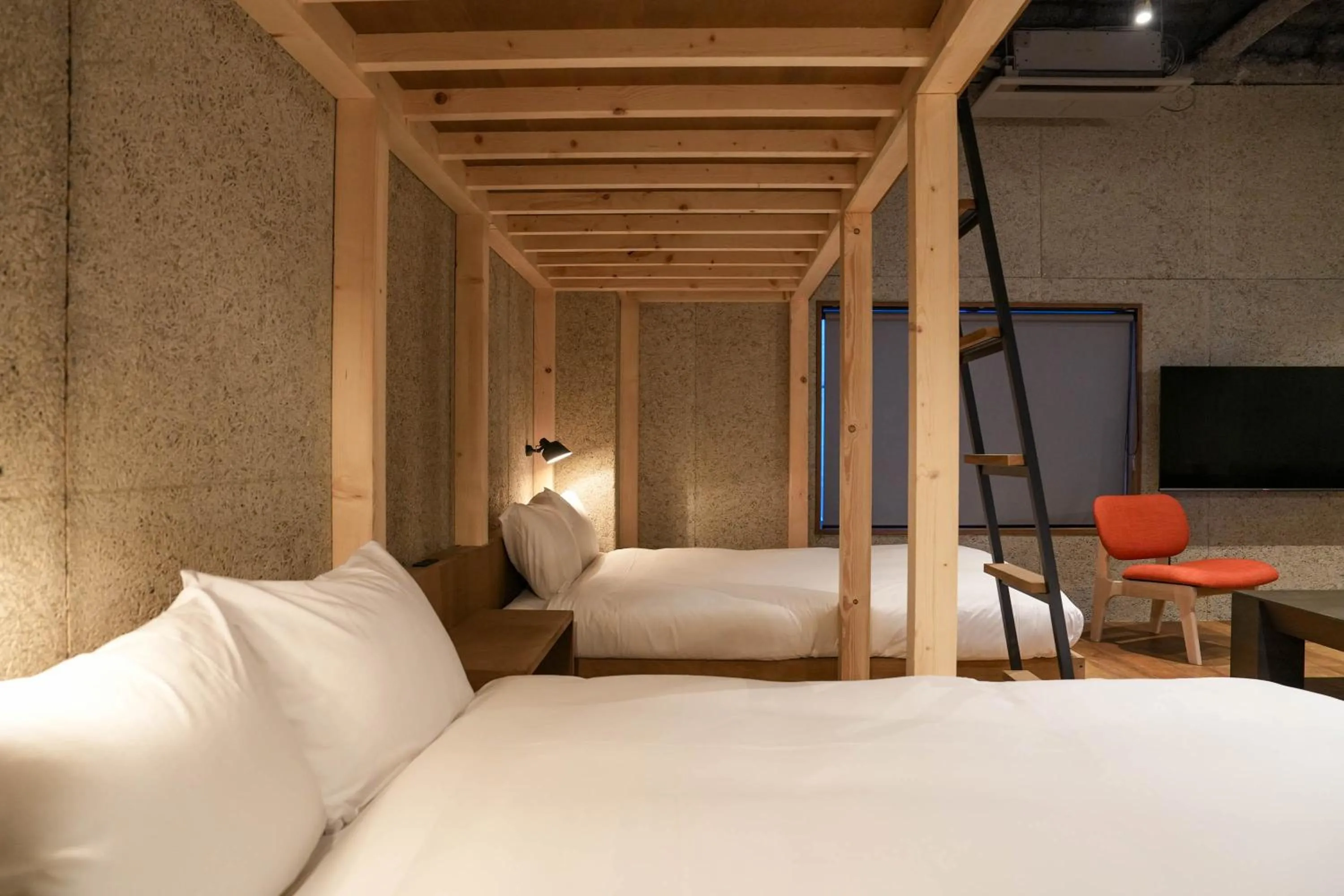 Bed in Green Room Hotel