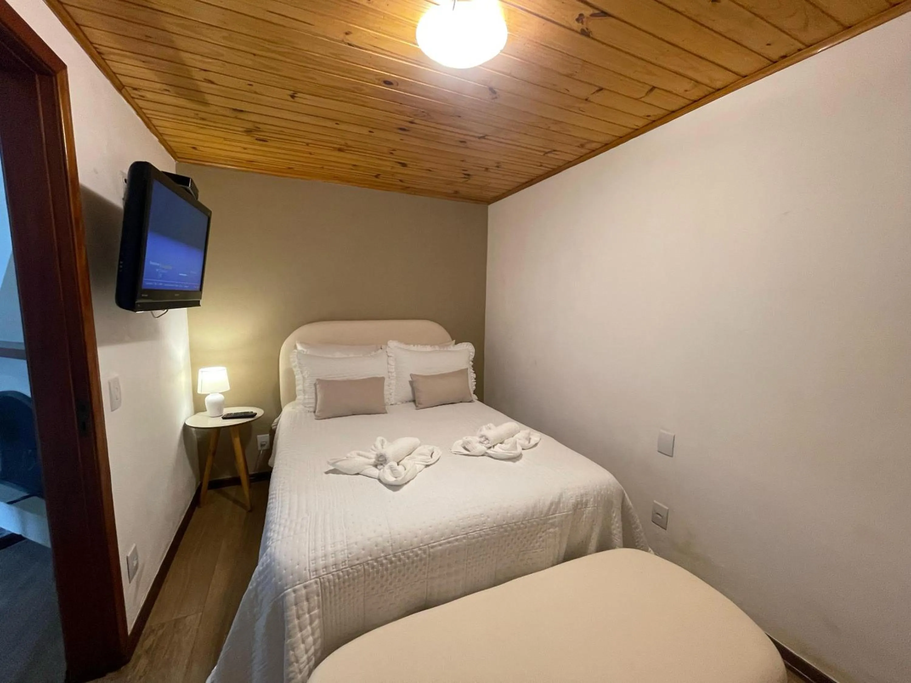 Bed in Pousada Flor de Lua Monte Verde