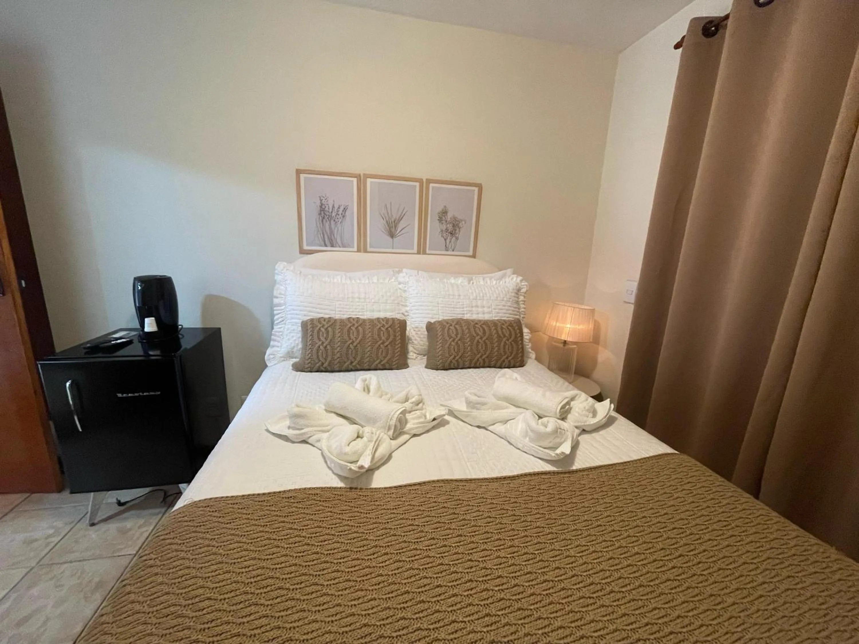 Bed in Pousada Flor de Lua Monte Verde