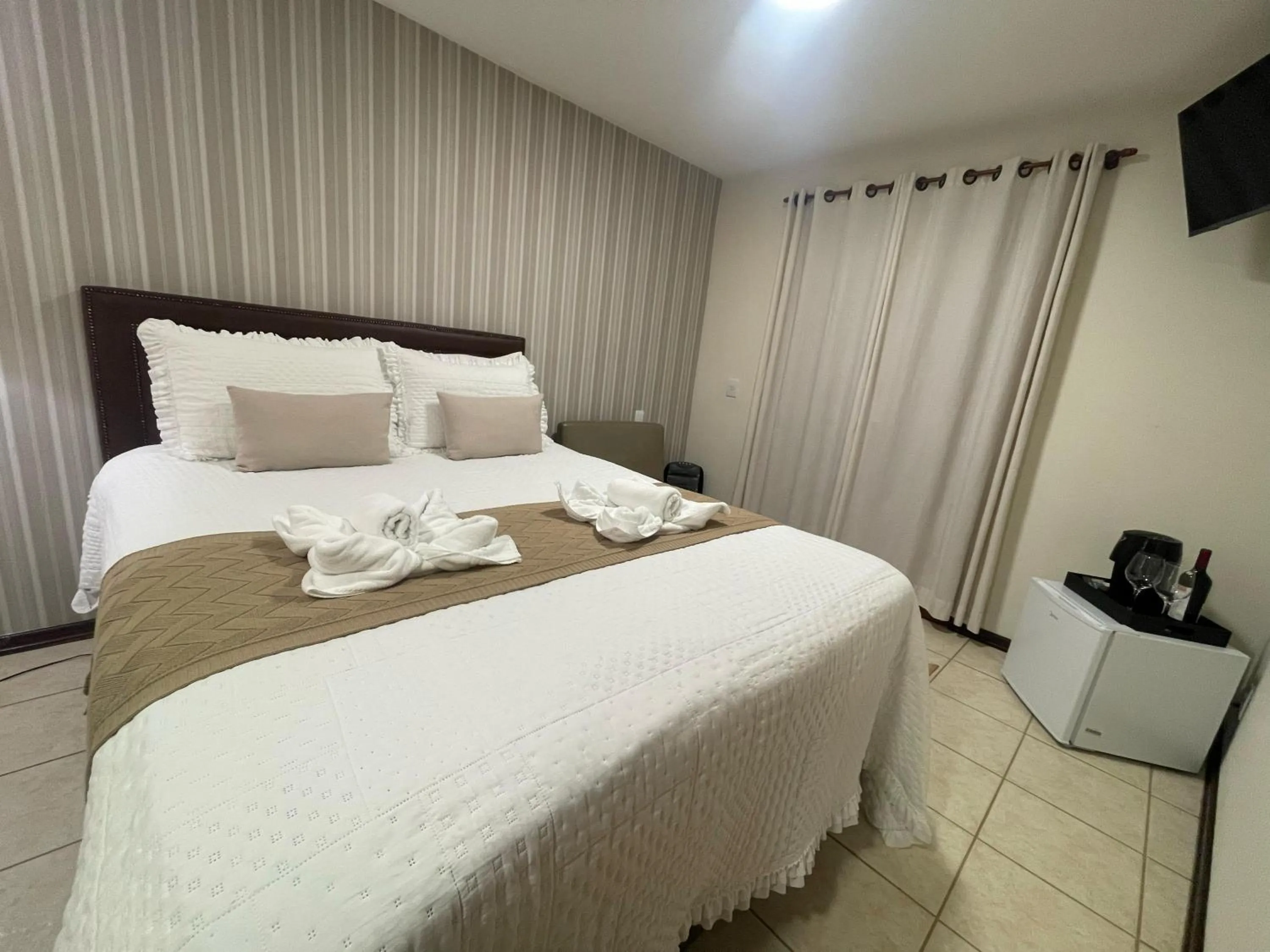 Bed in Pousada Flor de Lua Monte Verde