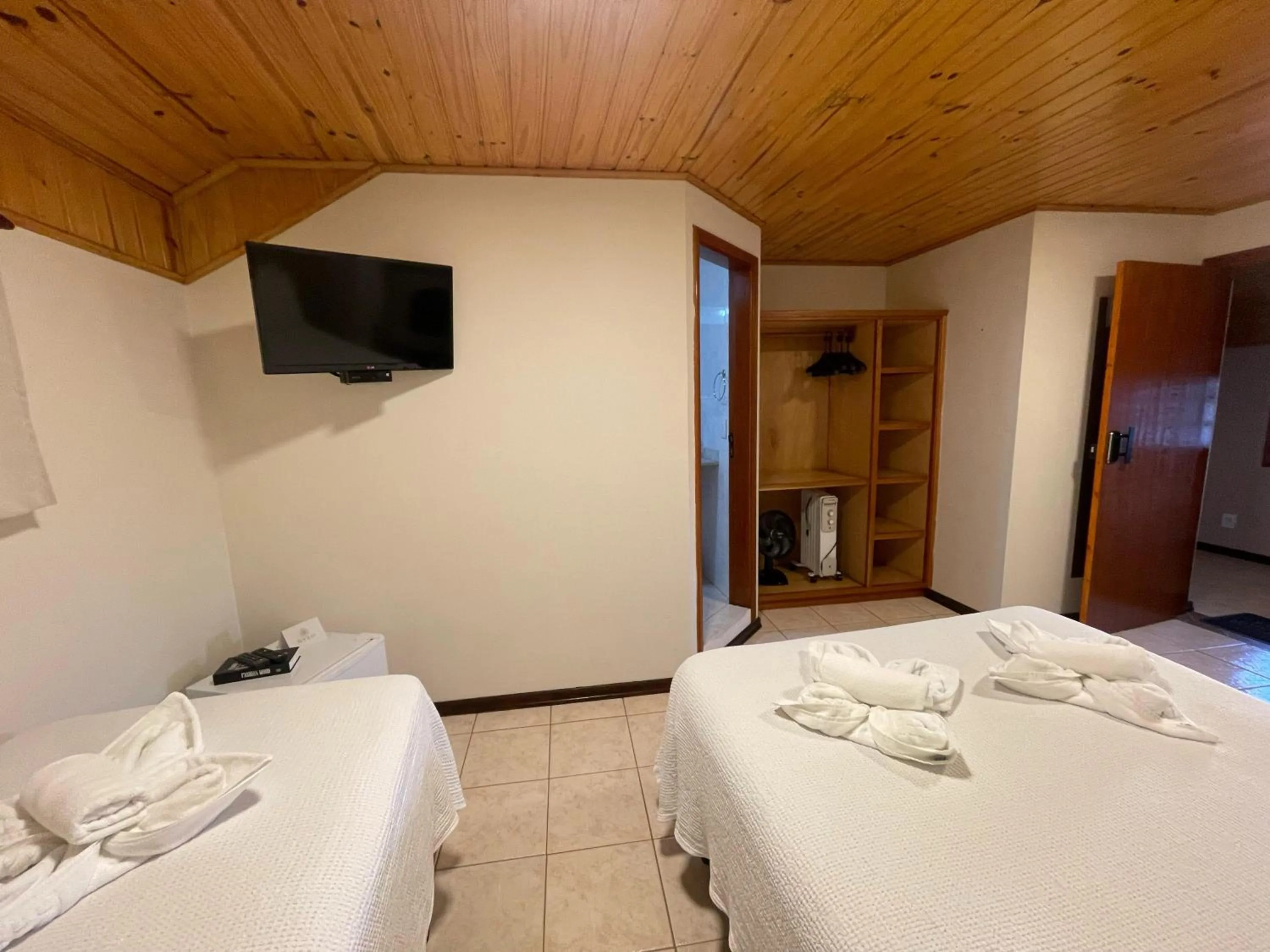 Bed in Pousada Flor de Lua Monte Verde