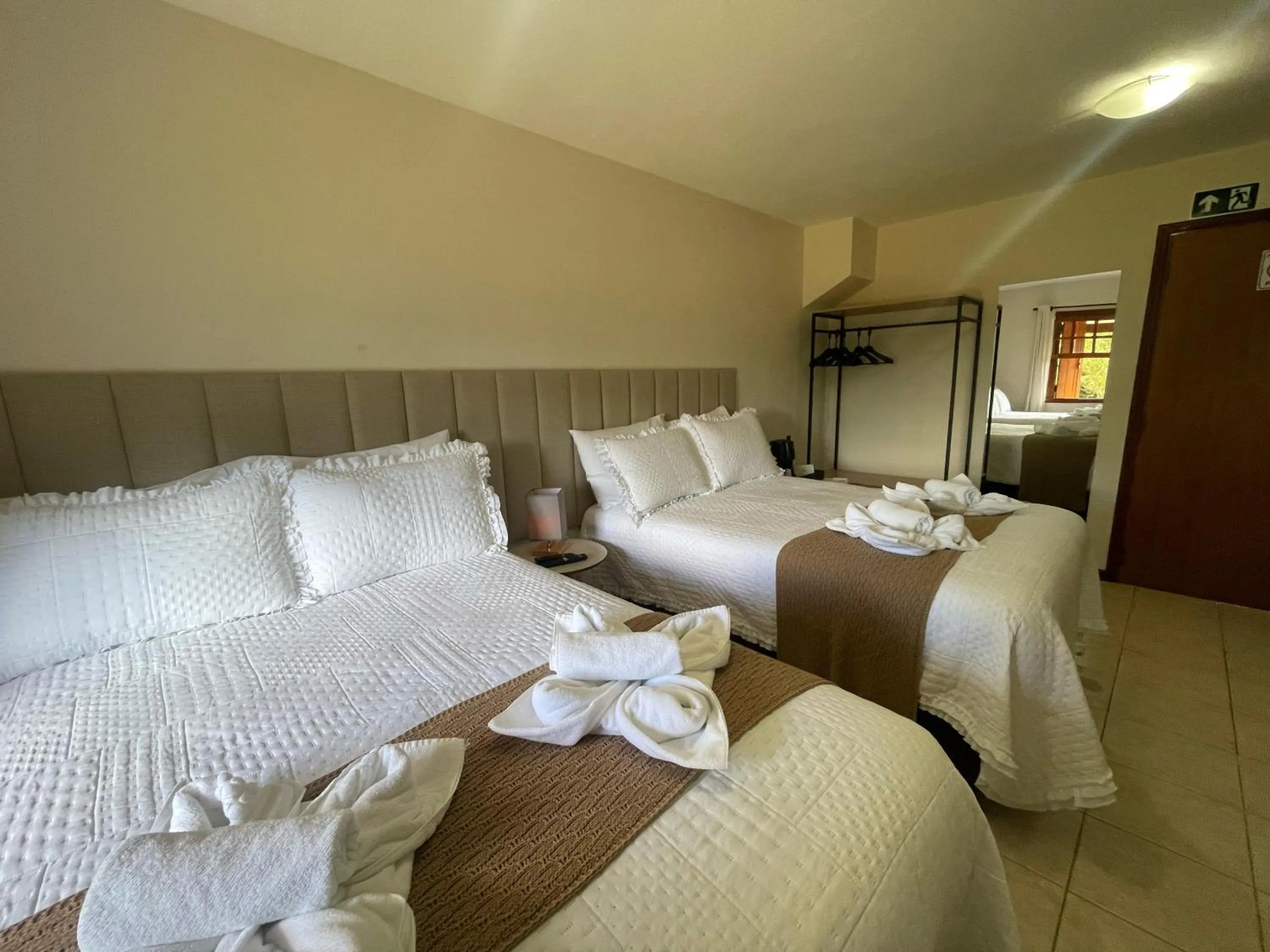 Bed in Pousada Flor de Lua Monte Verde