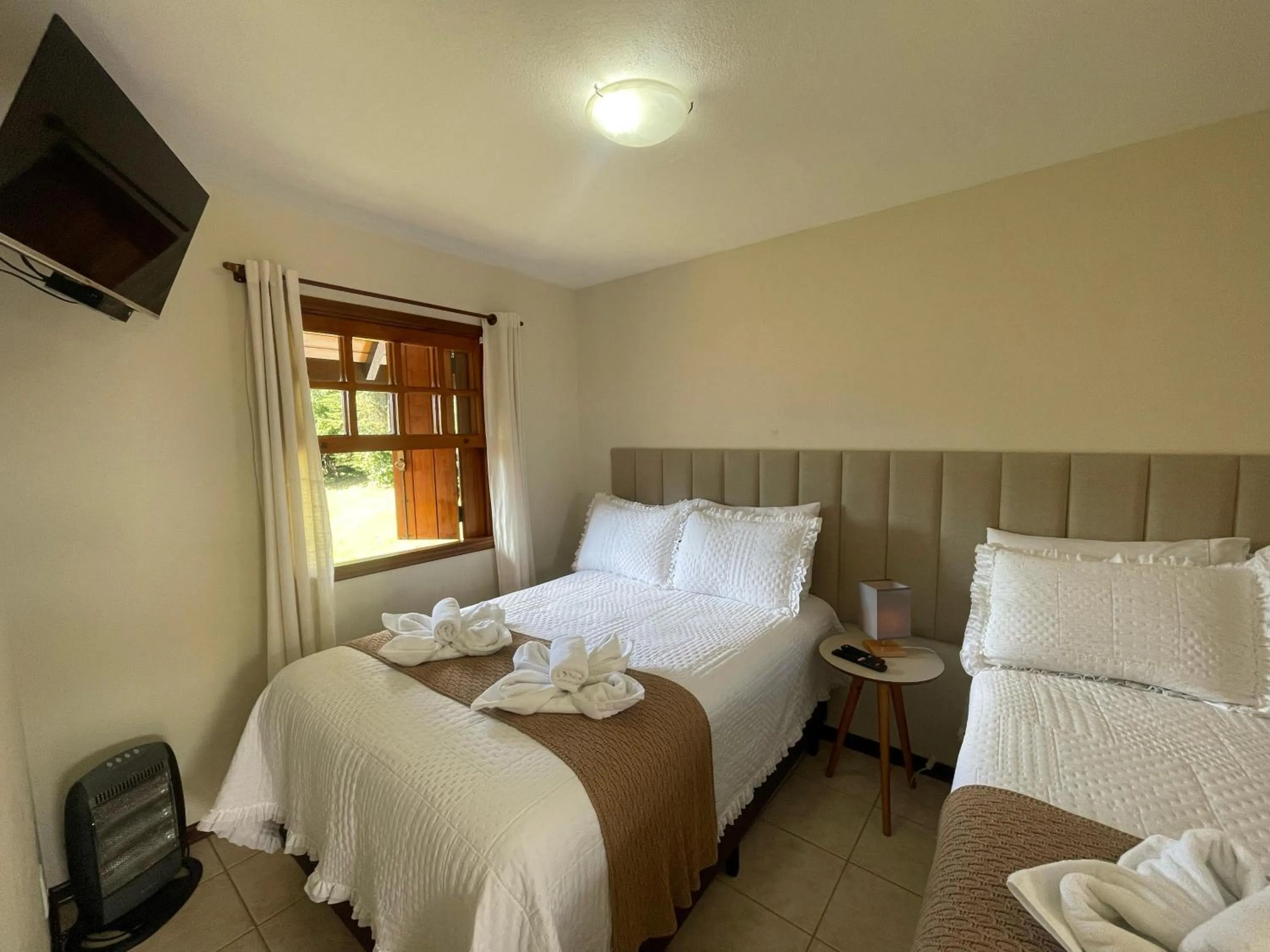 Bed in Pousada Flor de Lua Monte Verde