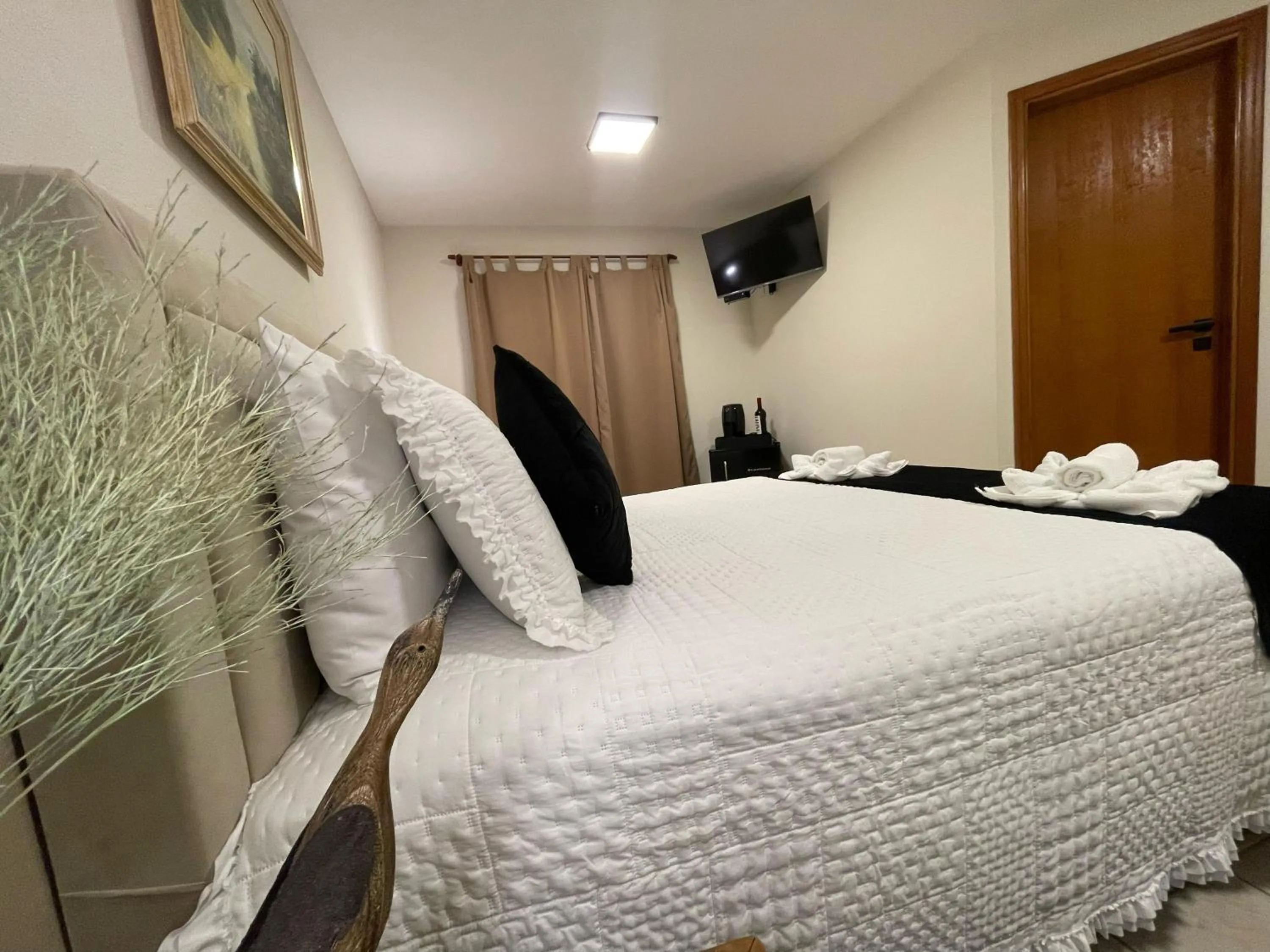 Bed in Pousada Flor de Lua Monte Verde