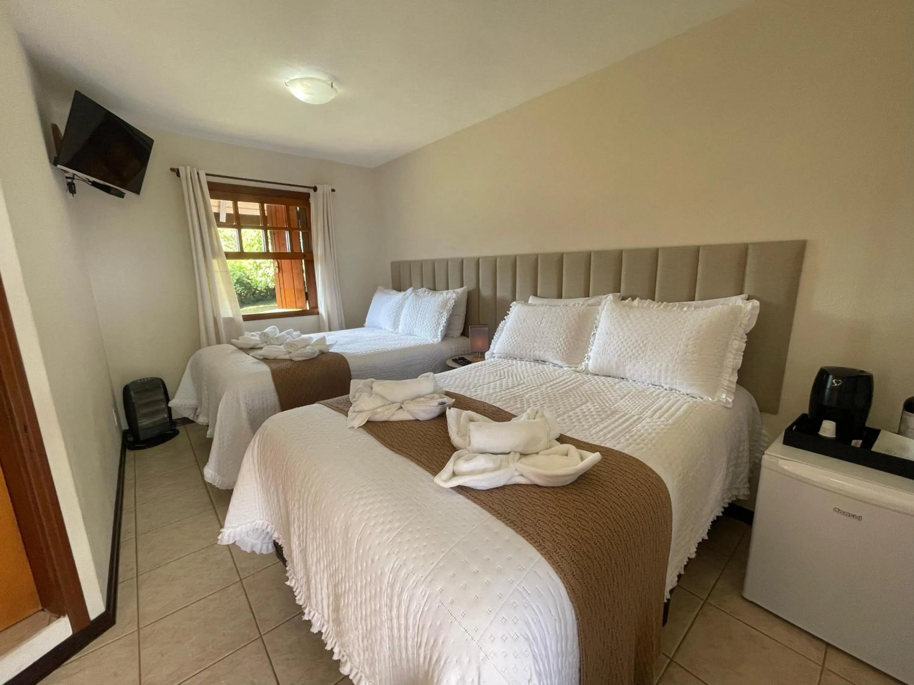 Bed in Pousada Flor de Lua Monte Verde