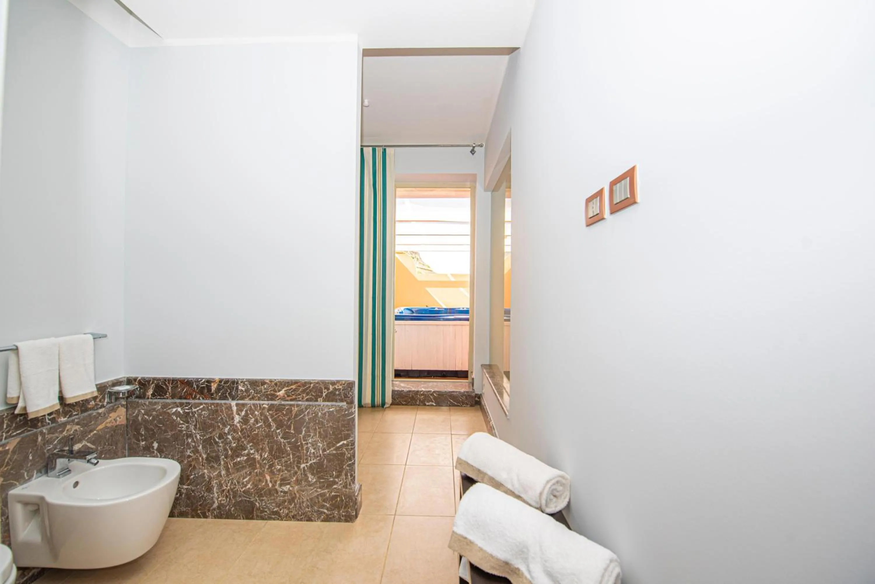 Bathroom in Baia Taormina - CDSHotels