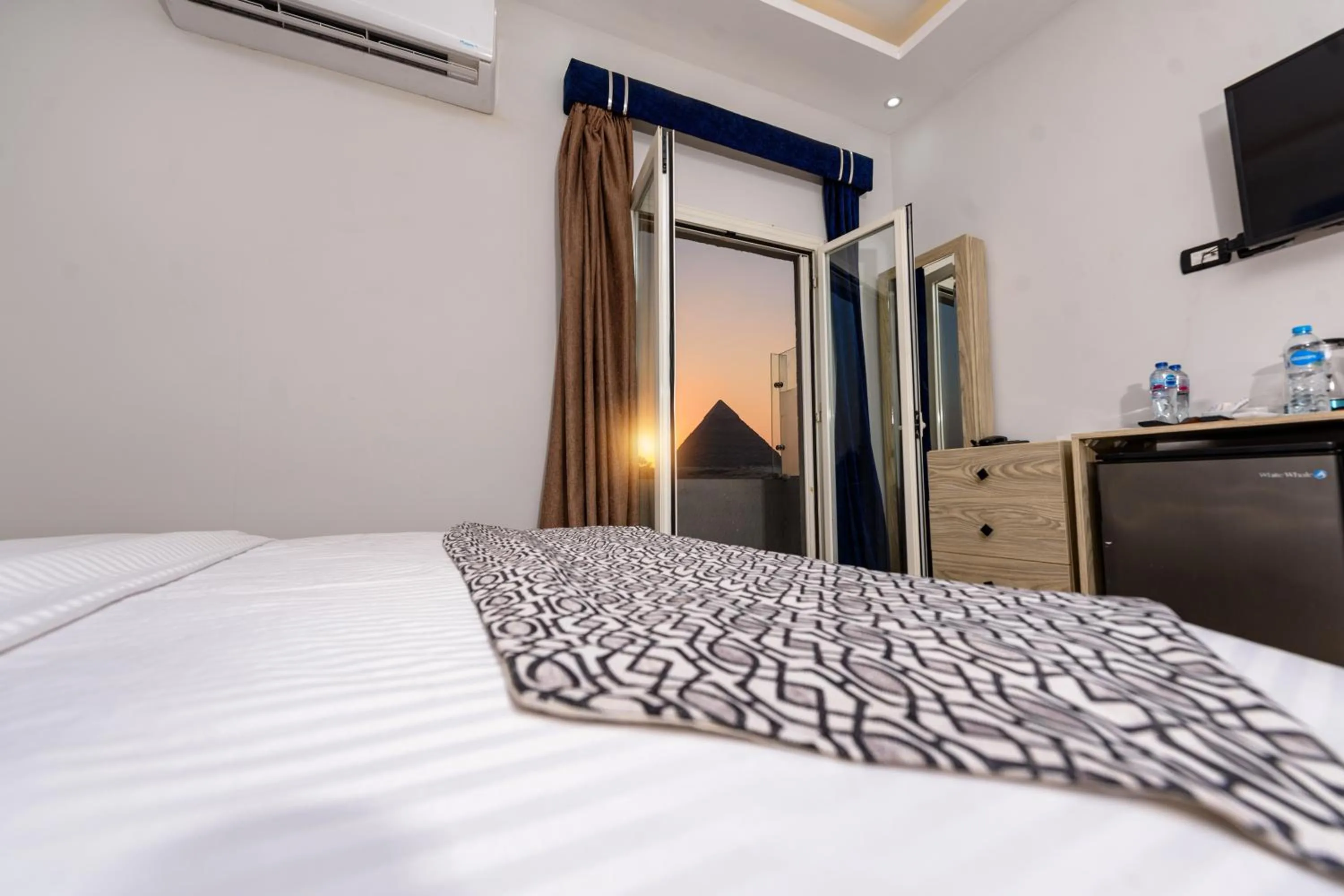 Bed in Capital Of Pyramids Hotel