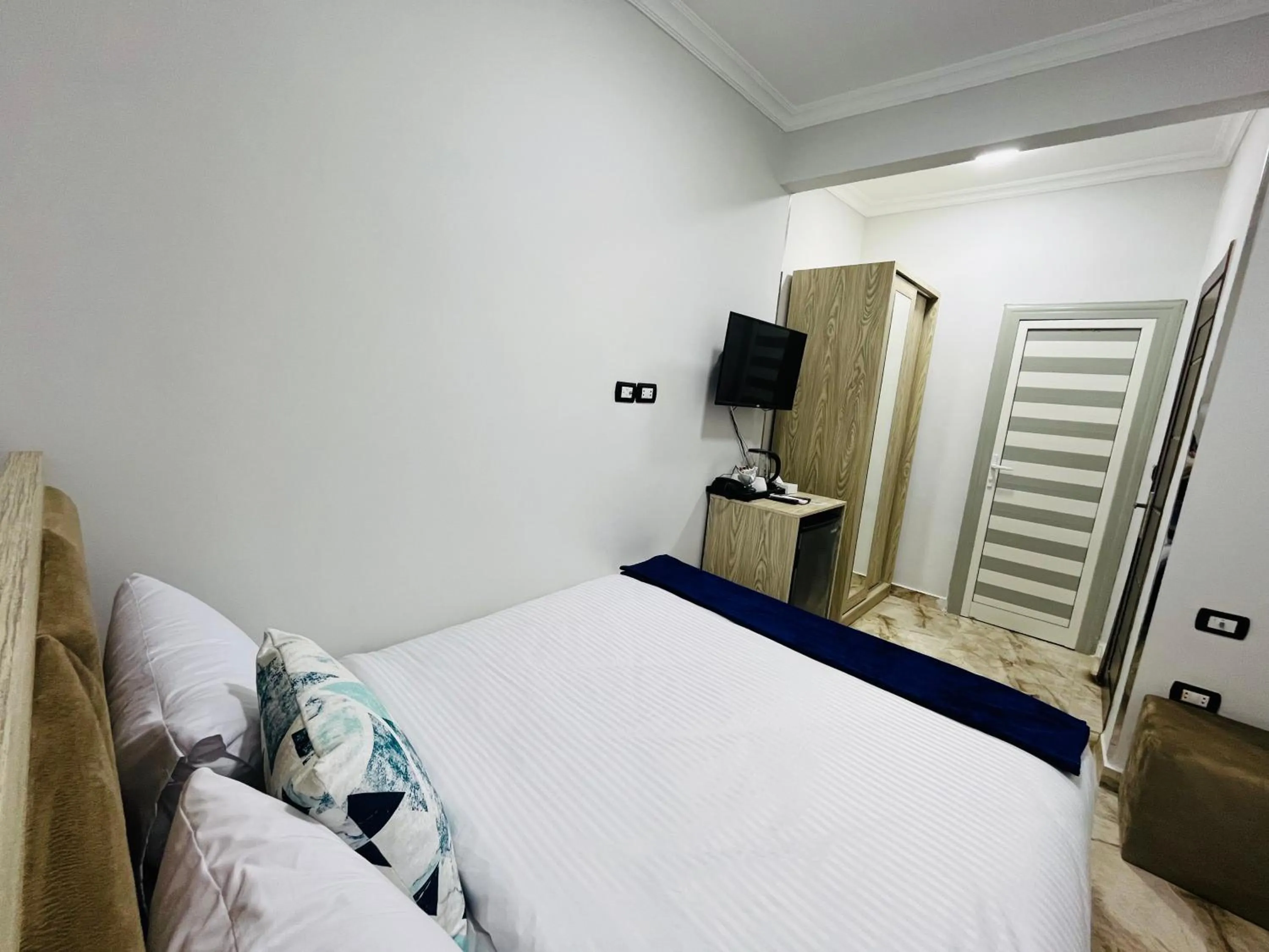 Photo of the whole room, Bed in Capital Of Pyramids Hotel