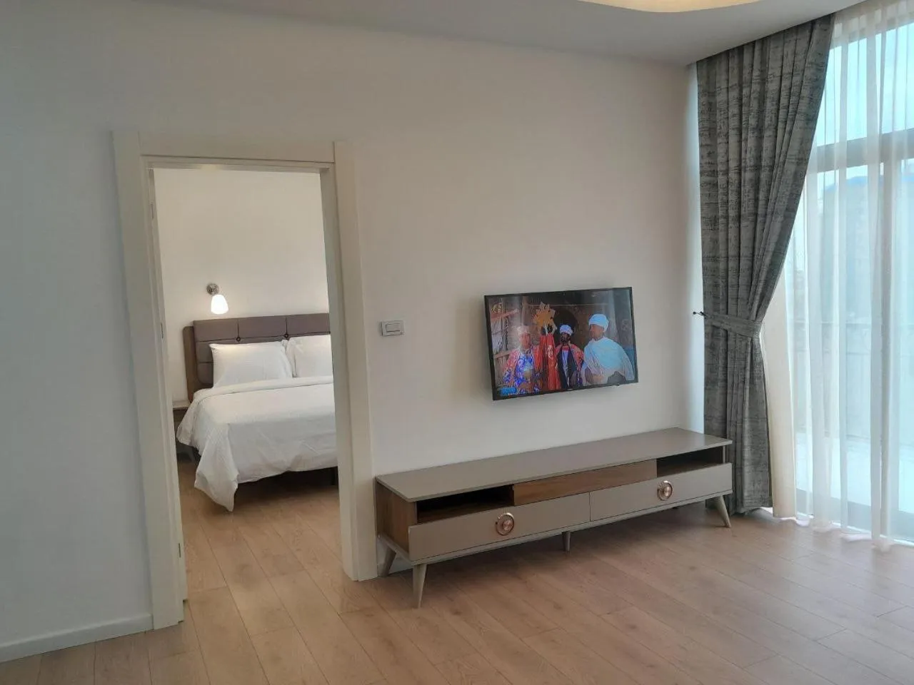 Communal lounge/ TV room, Bed in Zemilo Hotel Apartment