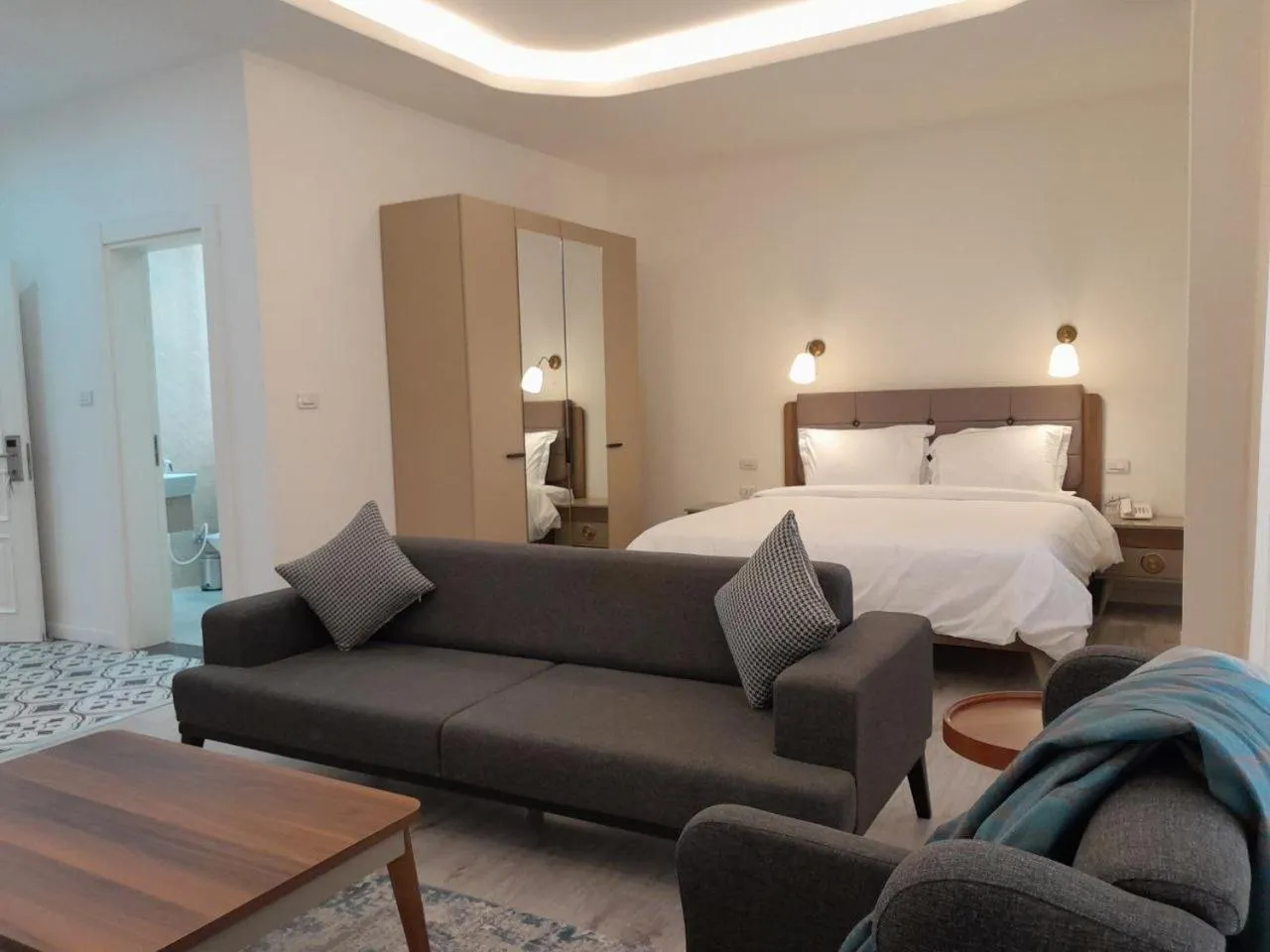 Bed in Zemilo Hotel Apartment