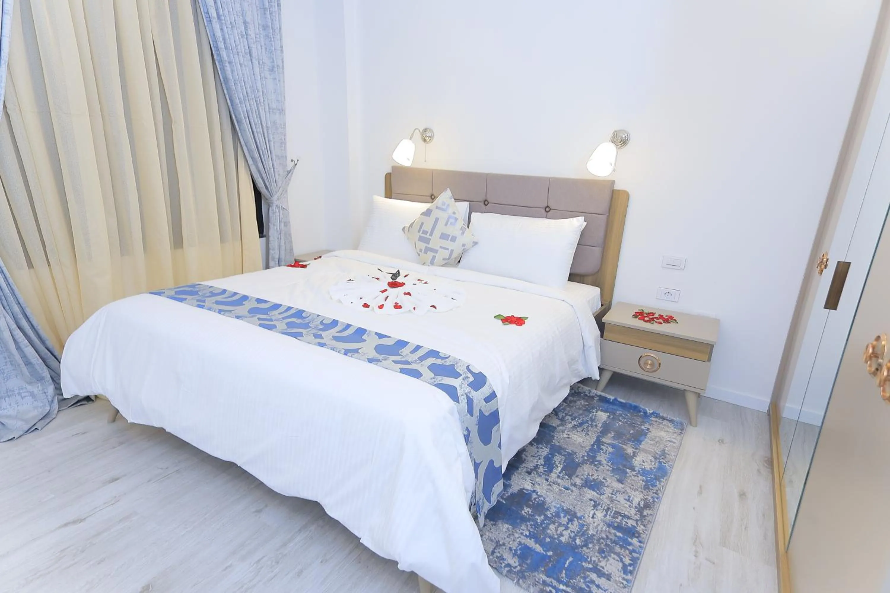 Bed in Zemilo Hotel Apartment