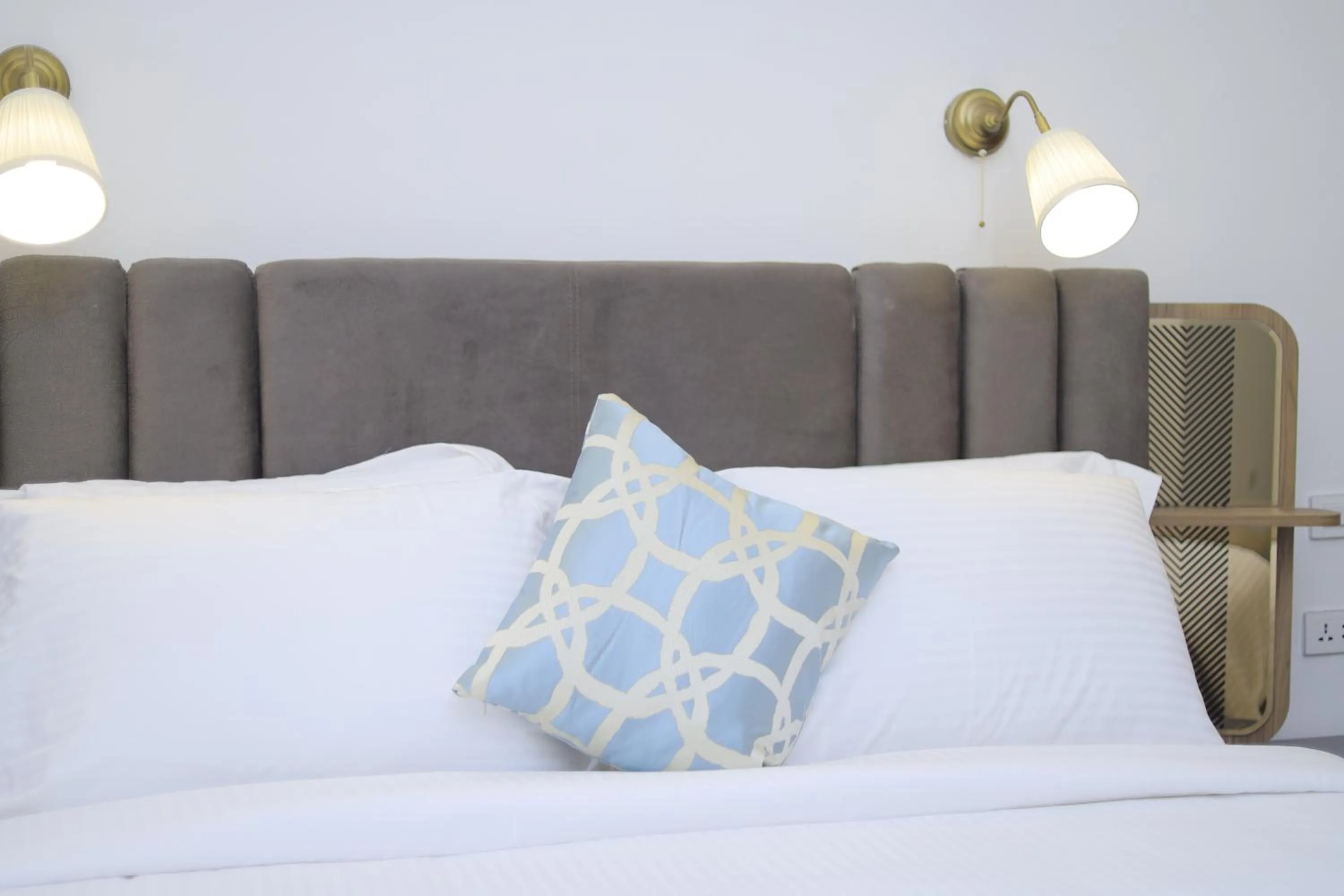 Bed in Zemilo Hotel Apartment