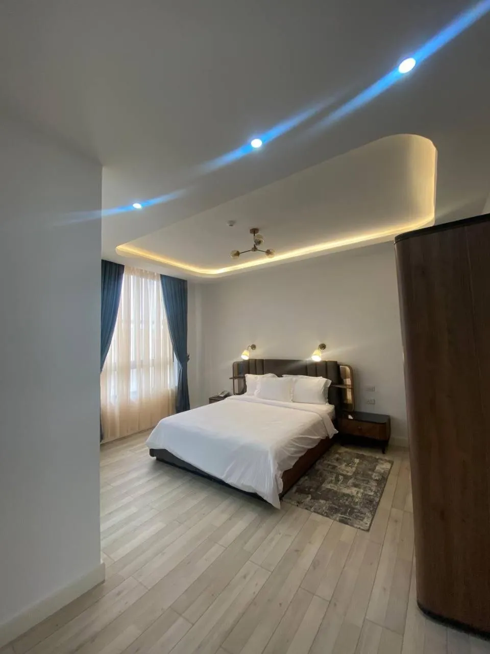 Bed in Zemilo Hotel Apartment