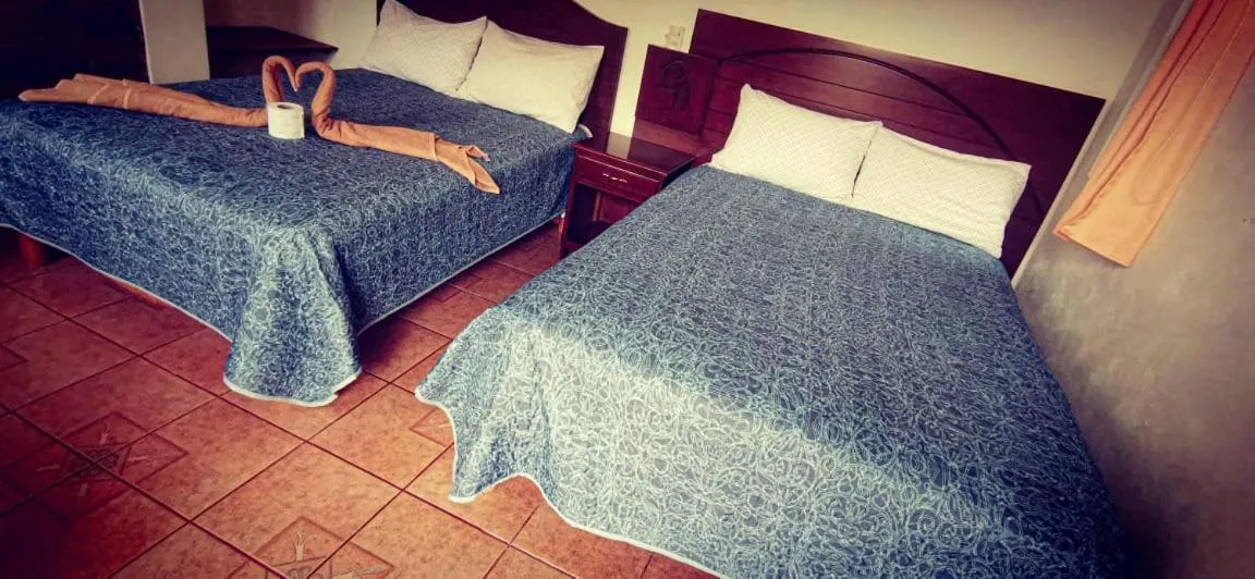 Bed in hotel posada los dominicos