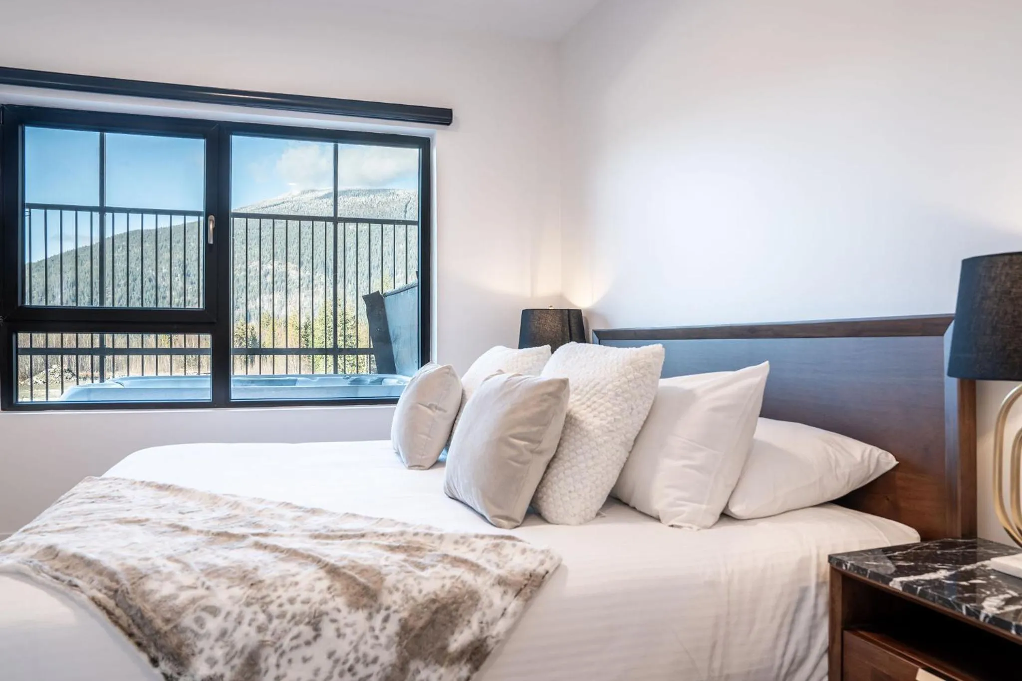 Bed in Mountainside Revival by Revelstoke Vacations