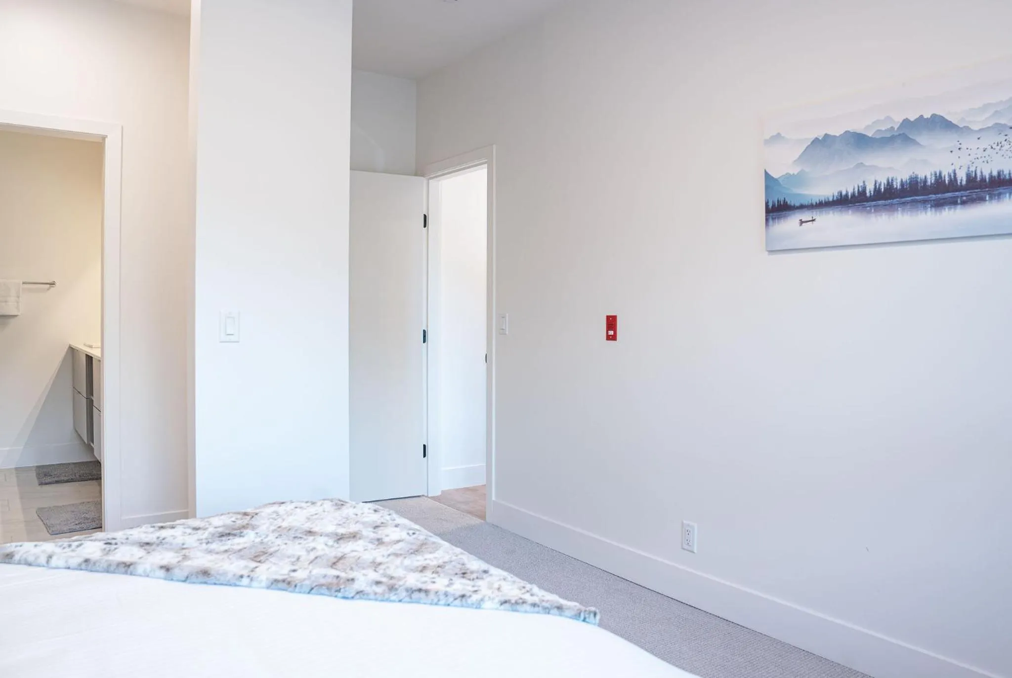 Bed in Mountainside Revival by Revelstoke Vacations