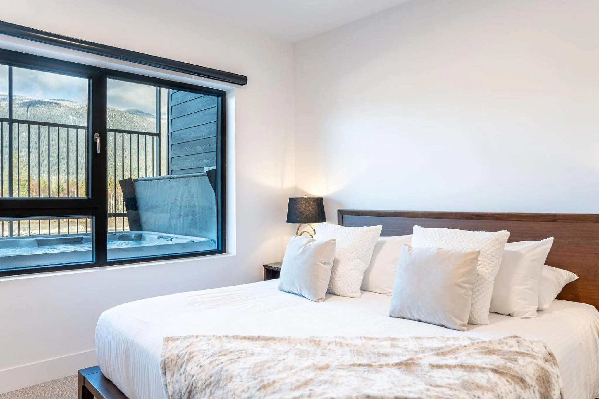 Bed in Mountainside Revival by Revelstoke Vacations
