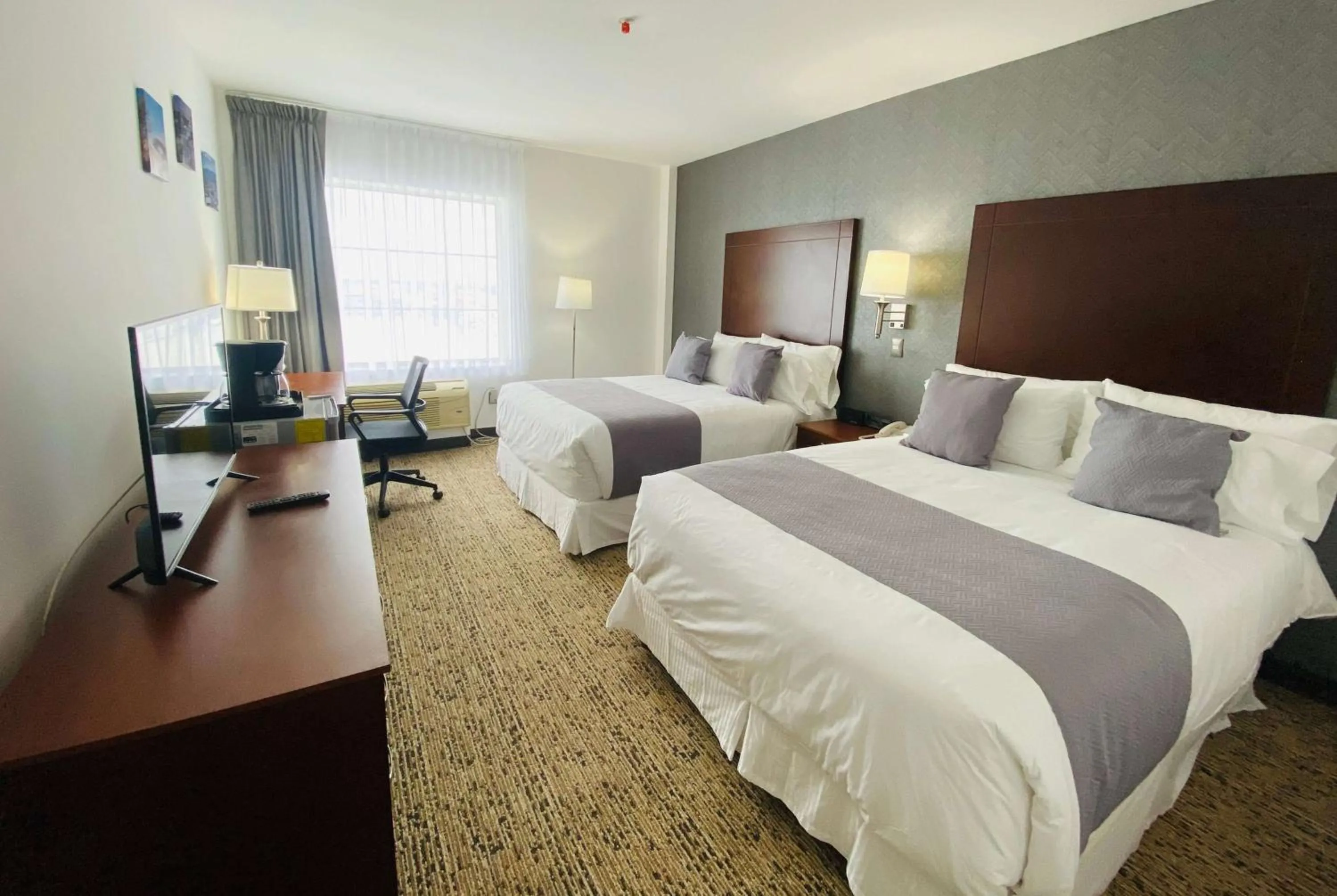 Photo of the whole room, Bed in La Quinta by Wyndham Reynosa