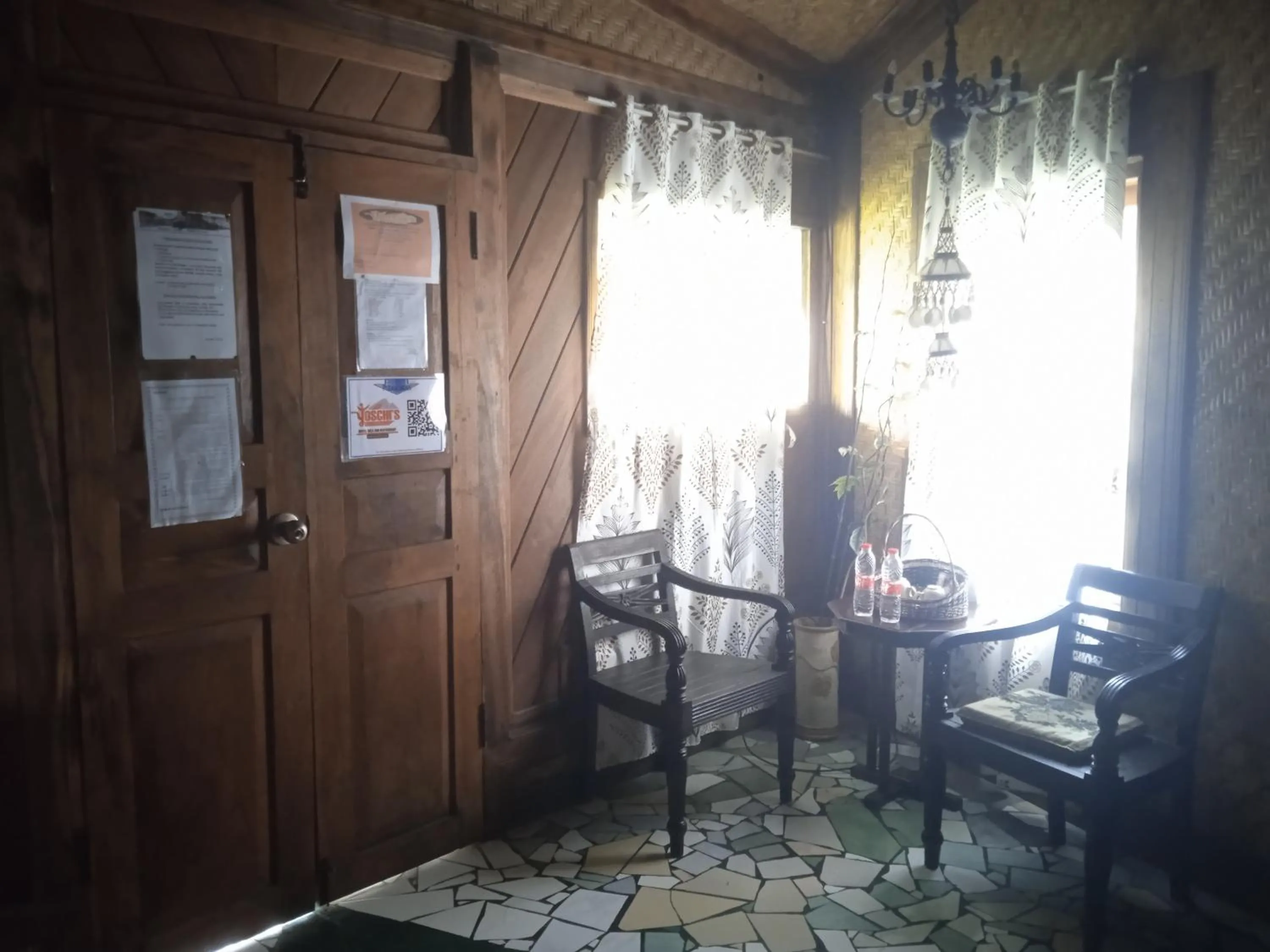 Seating area in Yoschi's Hotel Bromo