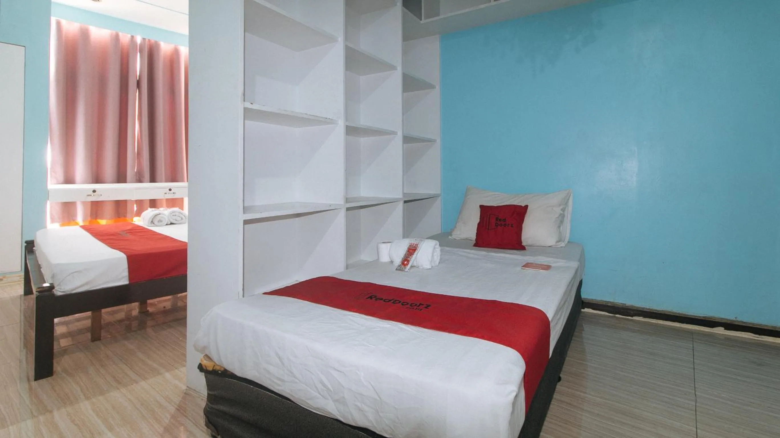 Bed in RedDoorz at TJMG by Bel Air Polaris Makati
