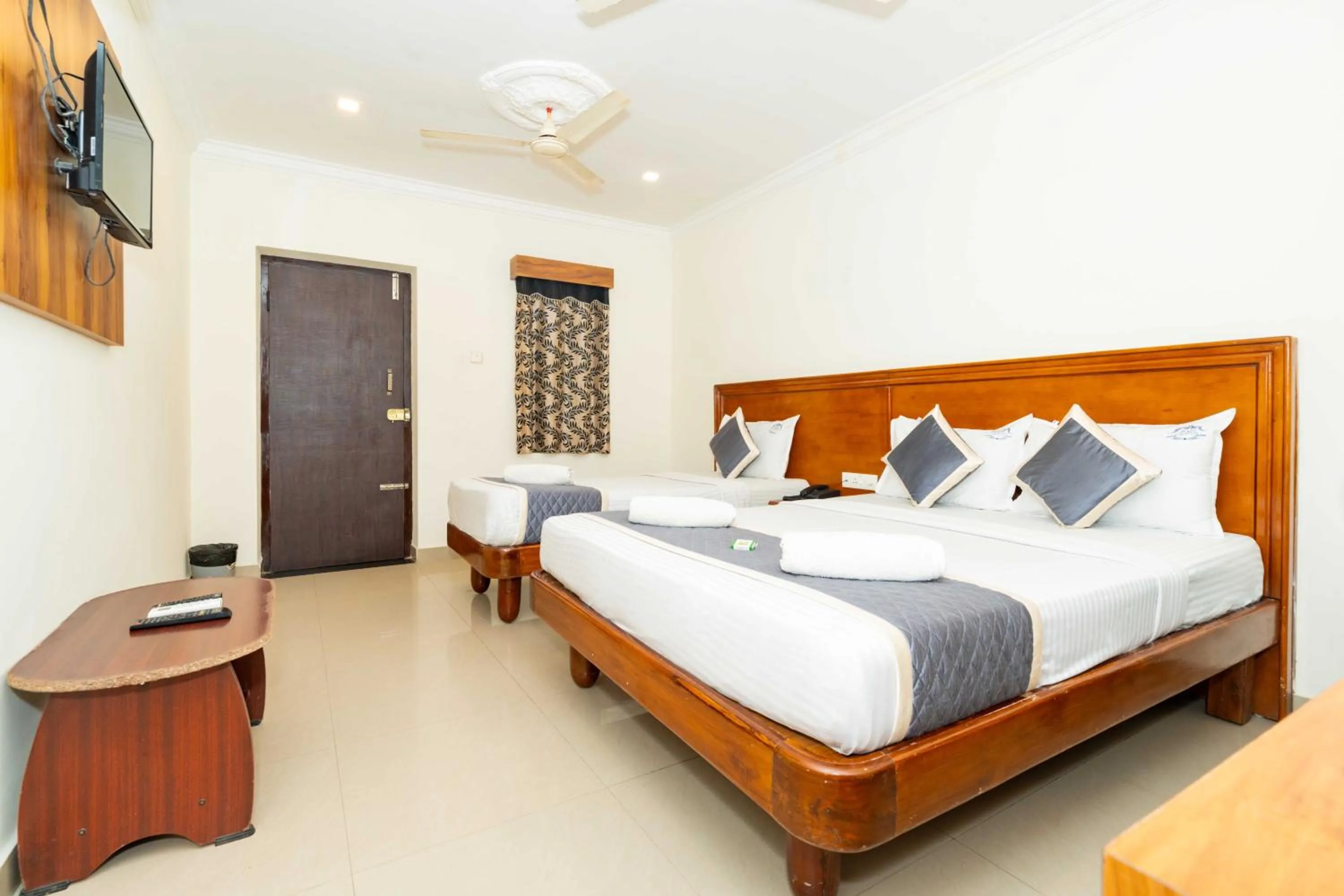 Bed in HOTEL NNP GRAND Rameswaram