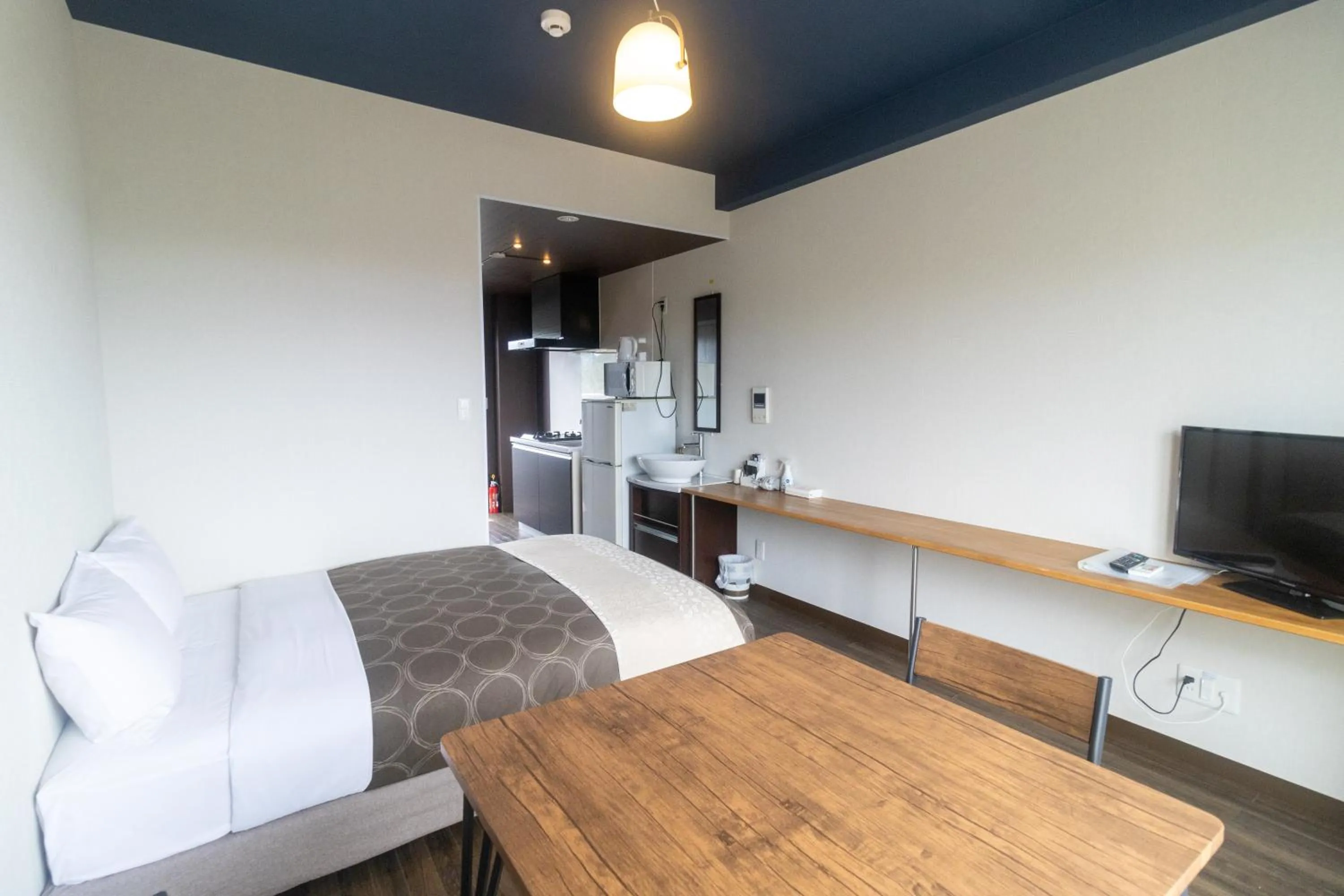 Bed in HOTEL Progress inn 名護 MATABee