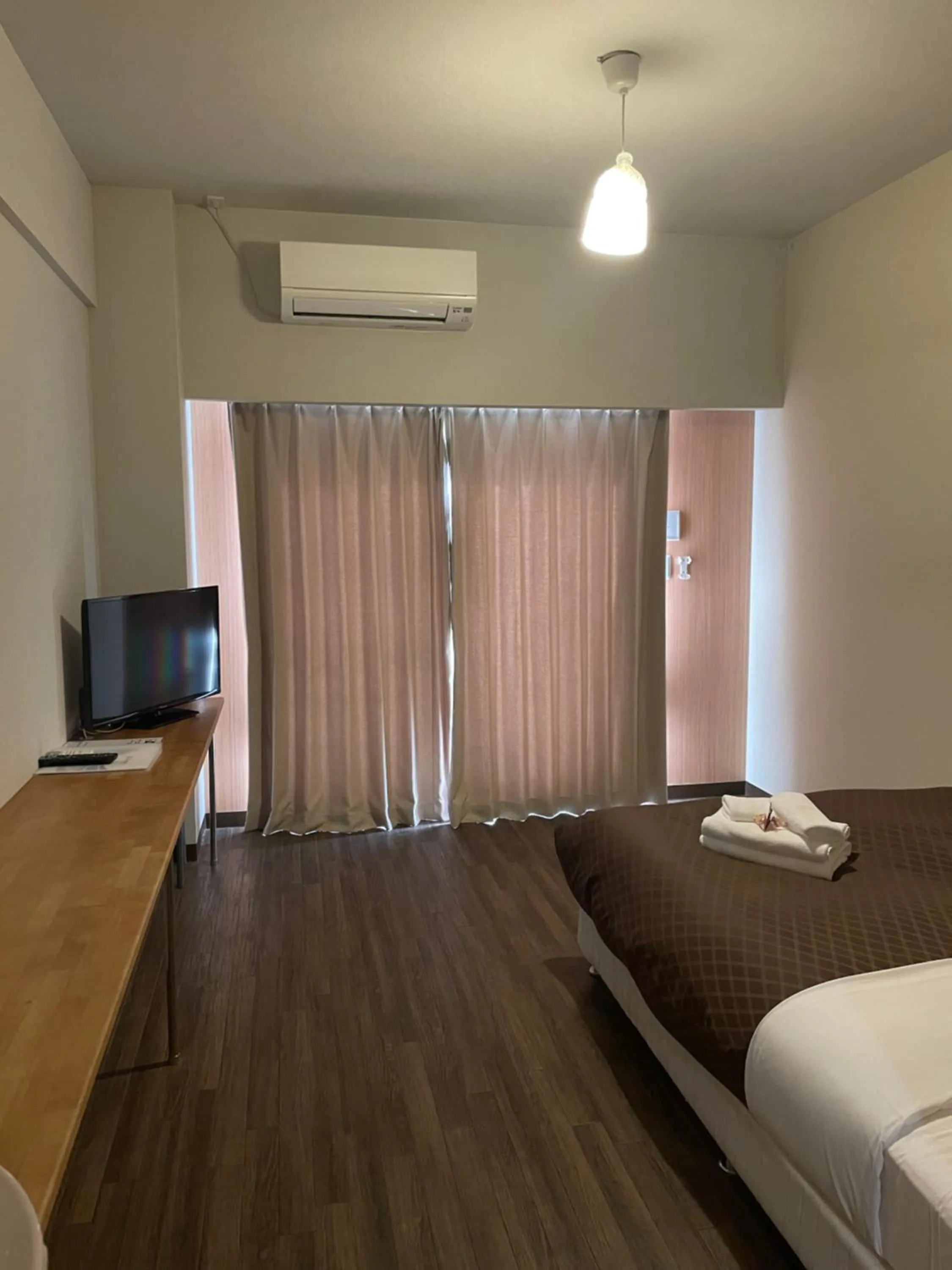 Bed in HOTEL Progress inn 名護 MATABee